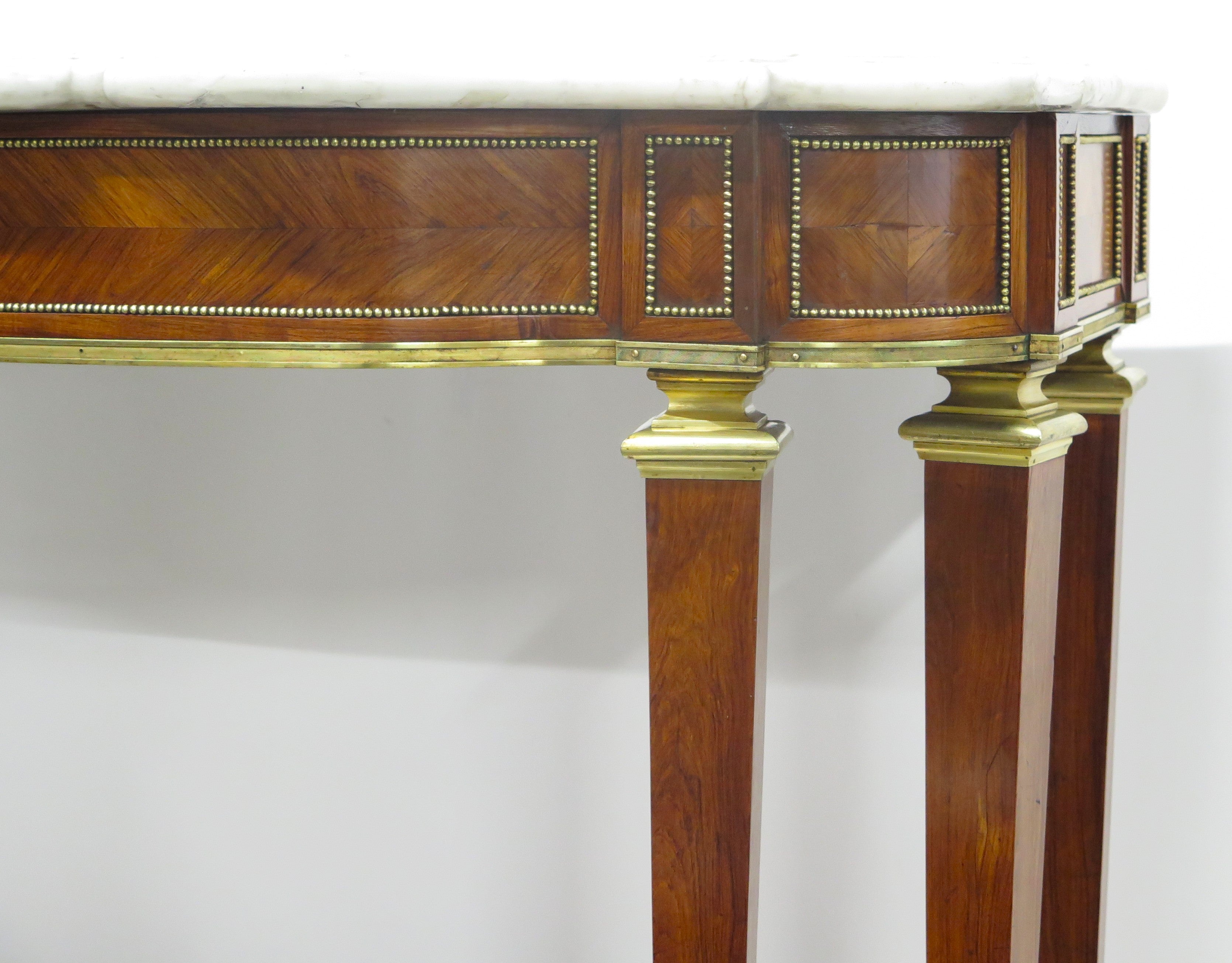 A 19th Century French Brass Mounted Console Table