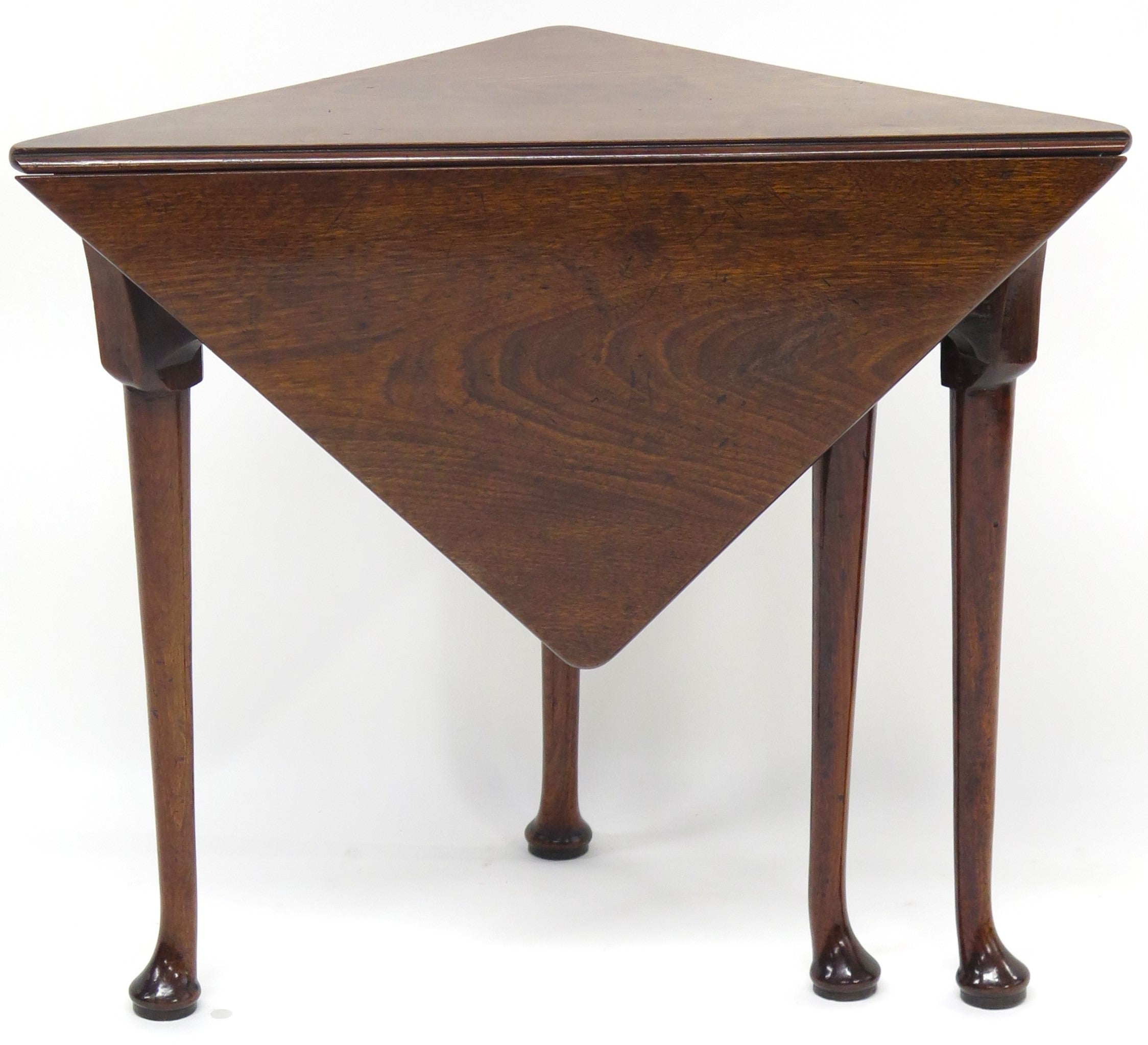 A George III mahogany drop leaf corner table