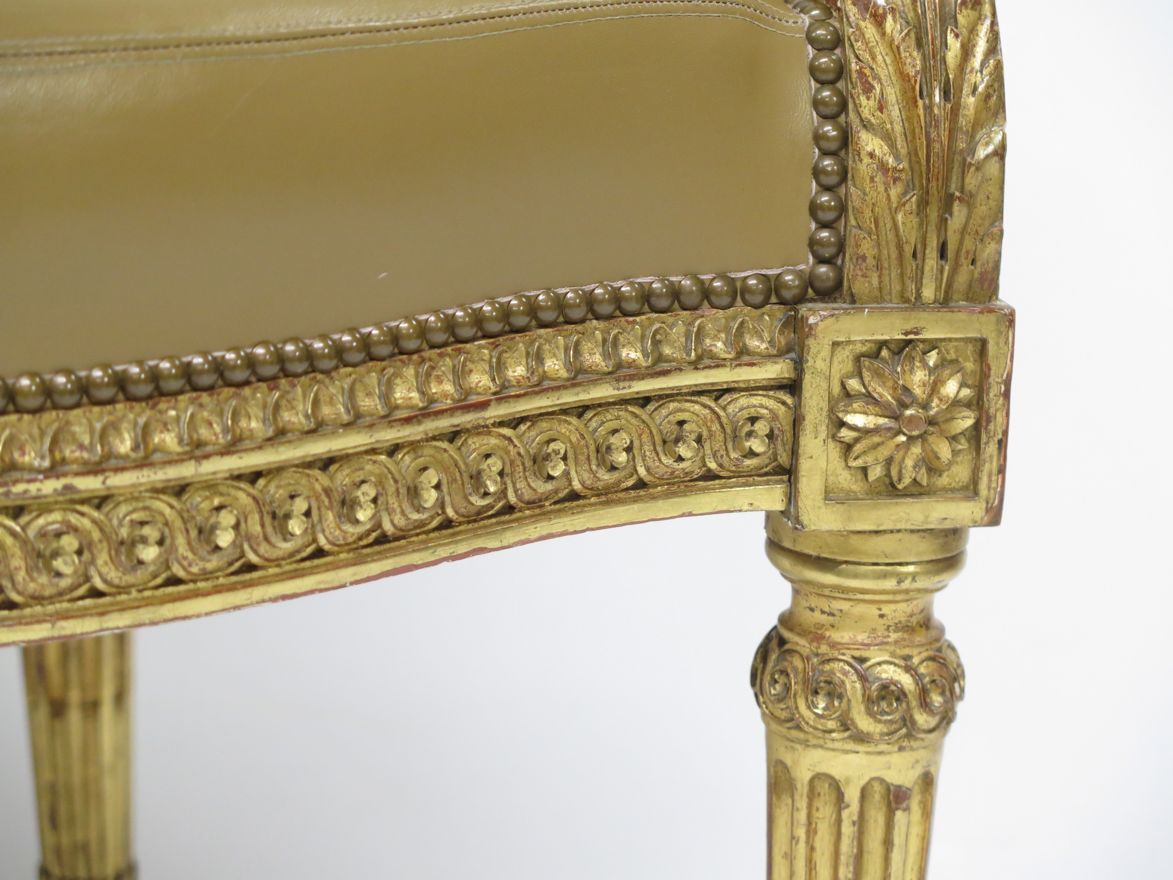 Louis XVI-Style Carved and Gilded Leather Fauteuil