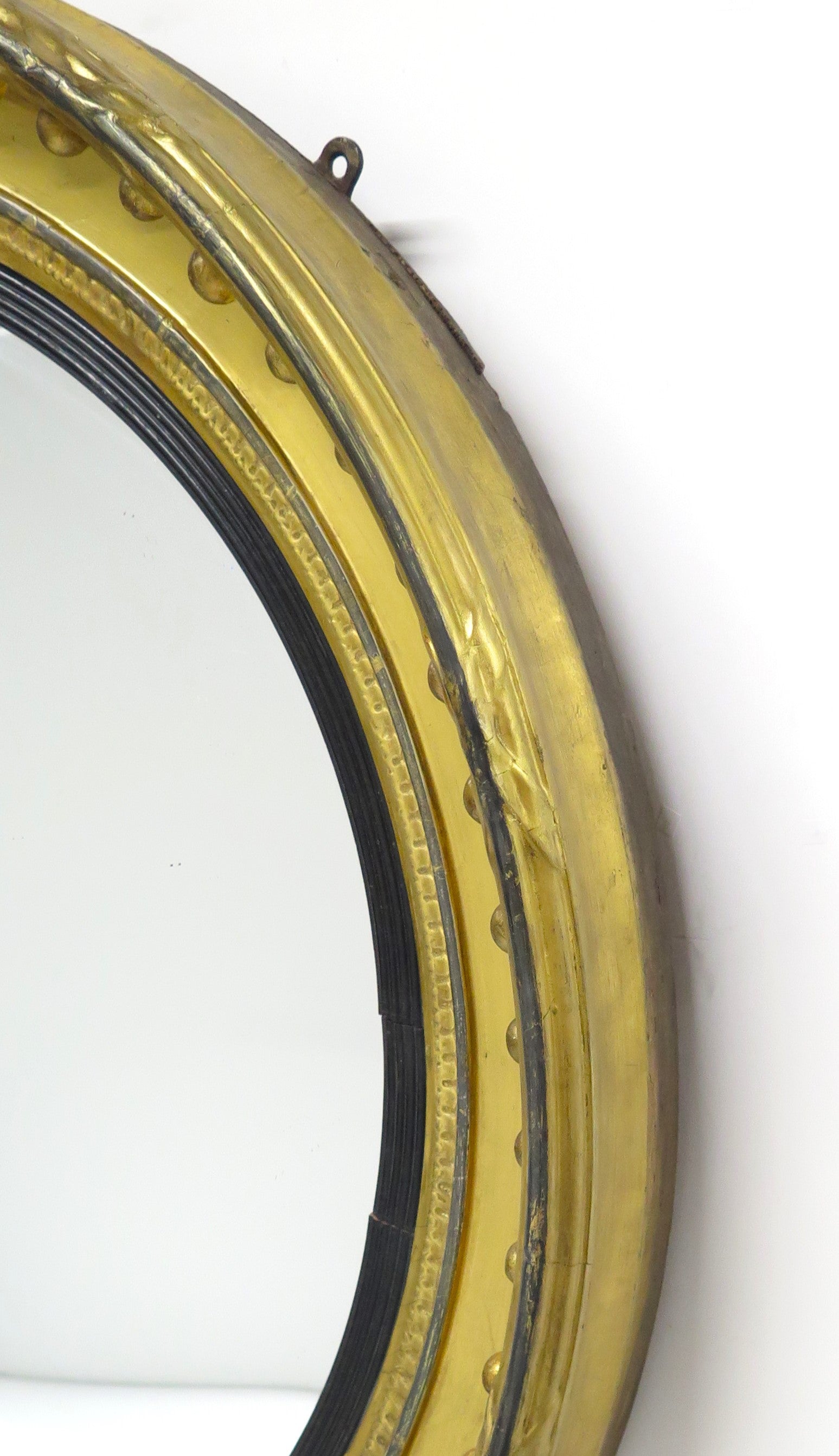 A Large English Regency Gilt Wood Convex Mirror
