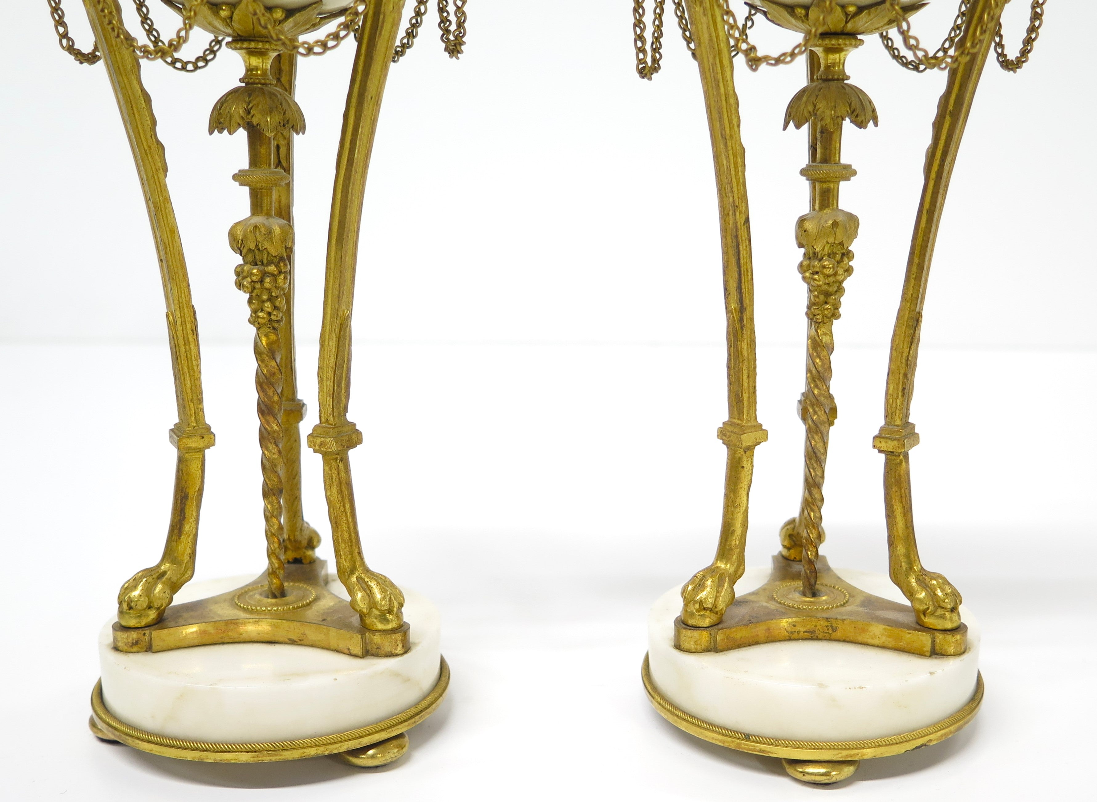 A Pair of Louis XVI Ormolu and White Marble Cassolettes