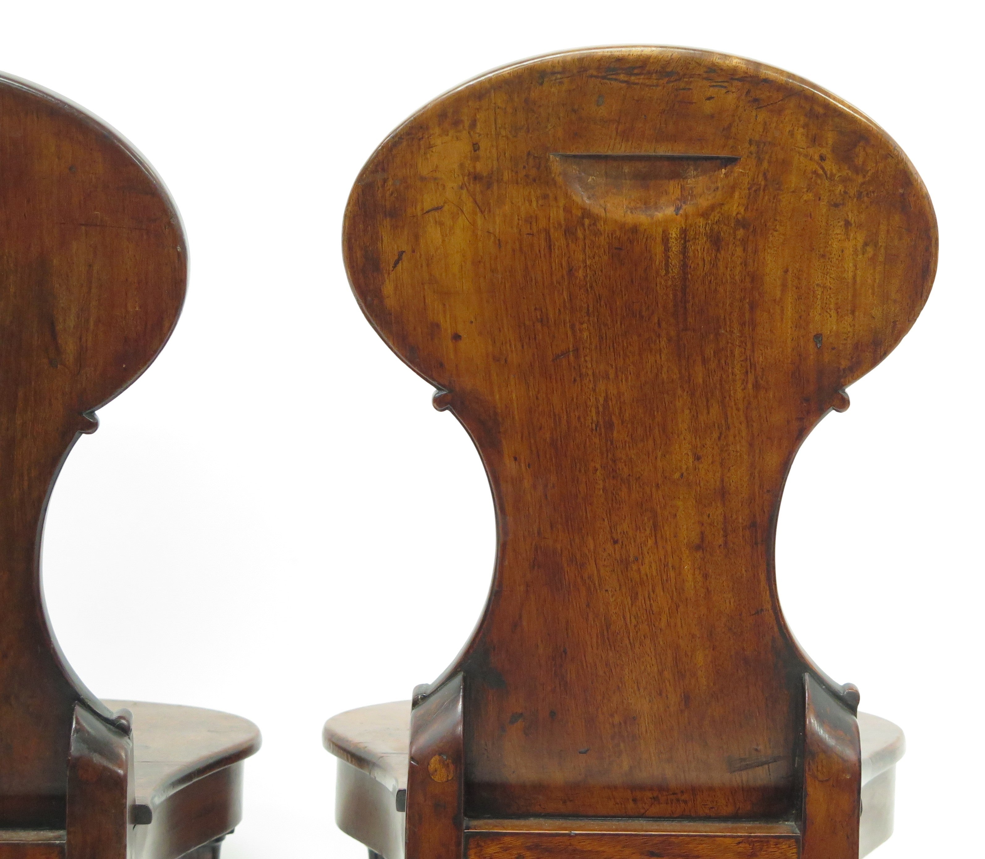 A Pair of English Regency Mahogany Hall Chairs