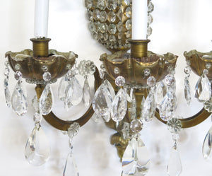 A Pair of Maison Jansen Three Light Bronze and Crystal Sconces