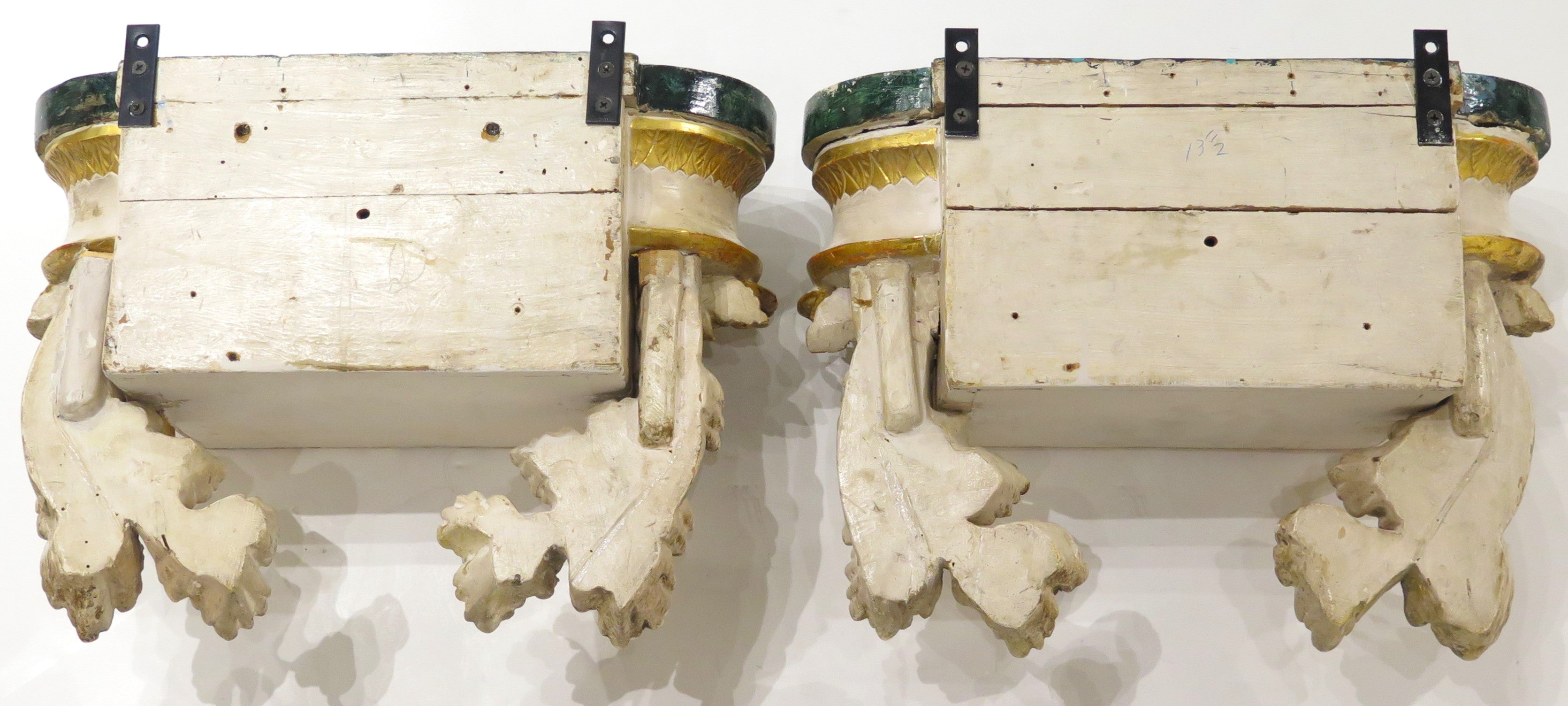 Pair of Carved Painted and Parcel Gilt Wall Brackets
