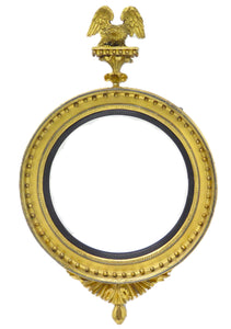 A Large English Regency Gilt Wood Convex Mirror