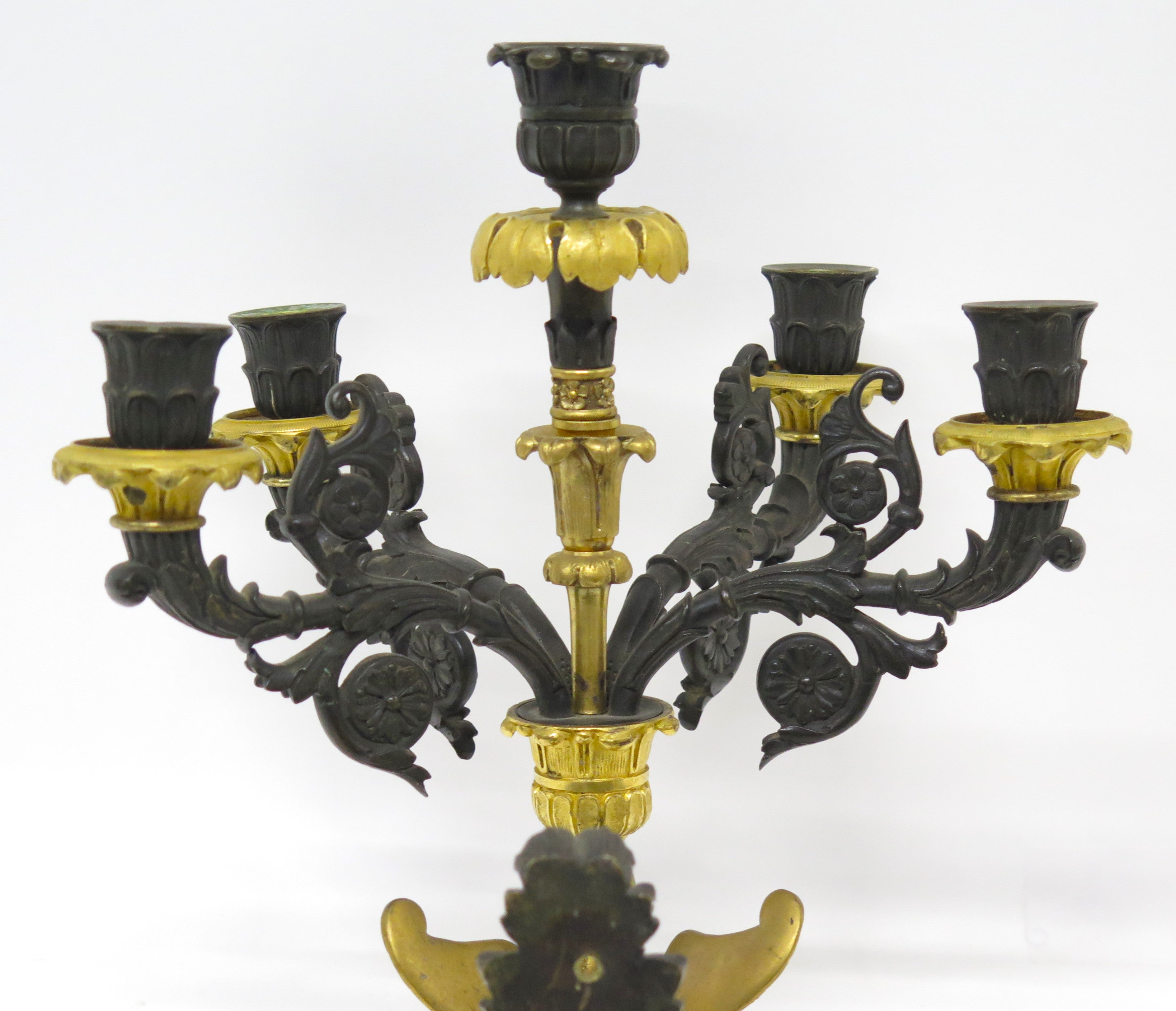 A Pair of Charles X Pattinated and Gilt Five Arm Wall Lights