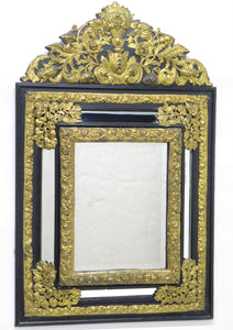 Dutch Looking Glass of Ebony and Brass Repoussé