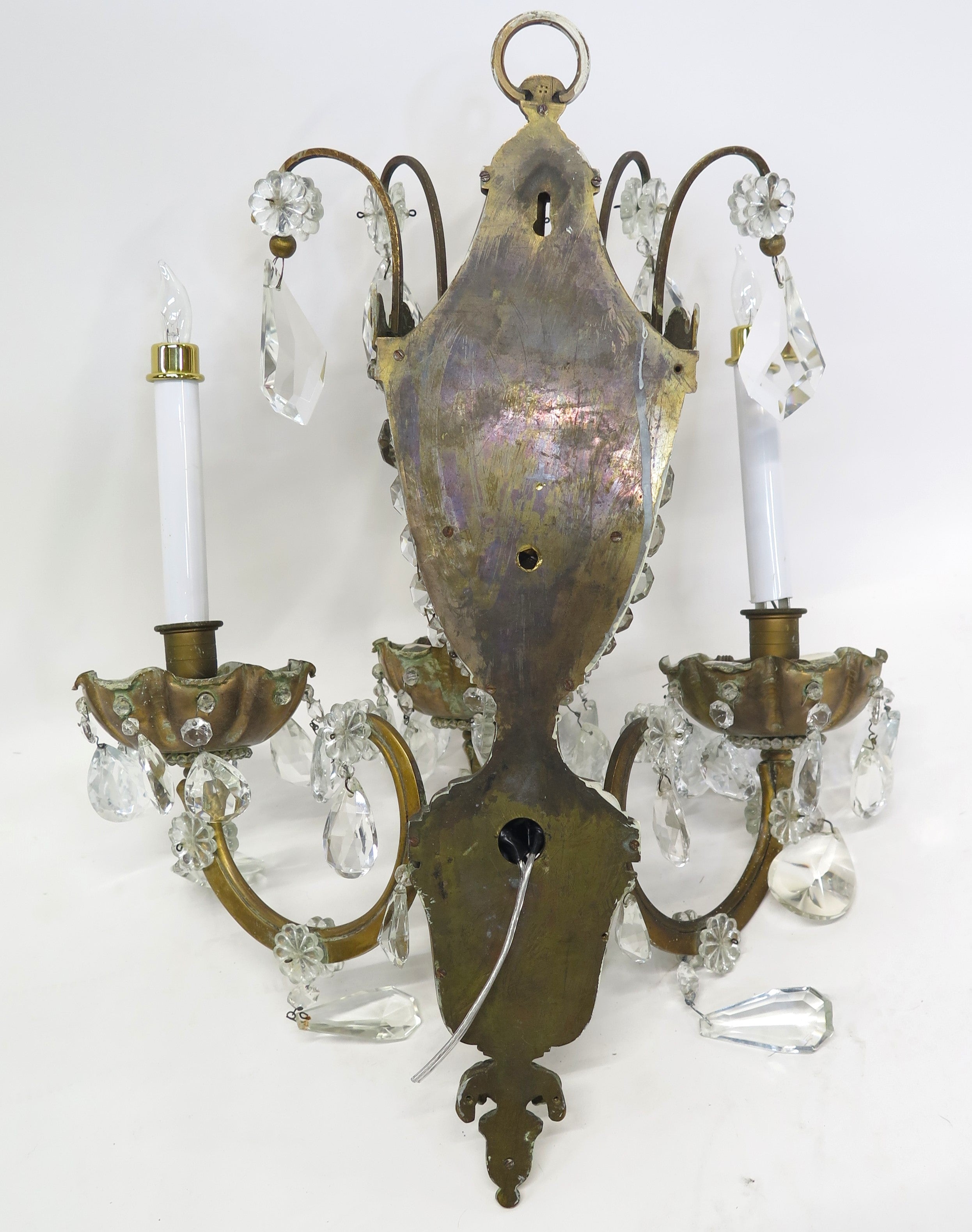 A Pair of Maison Jansen Three Light Bronze and Crystal Sconces