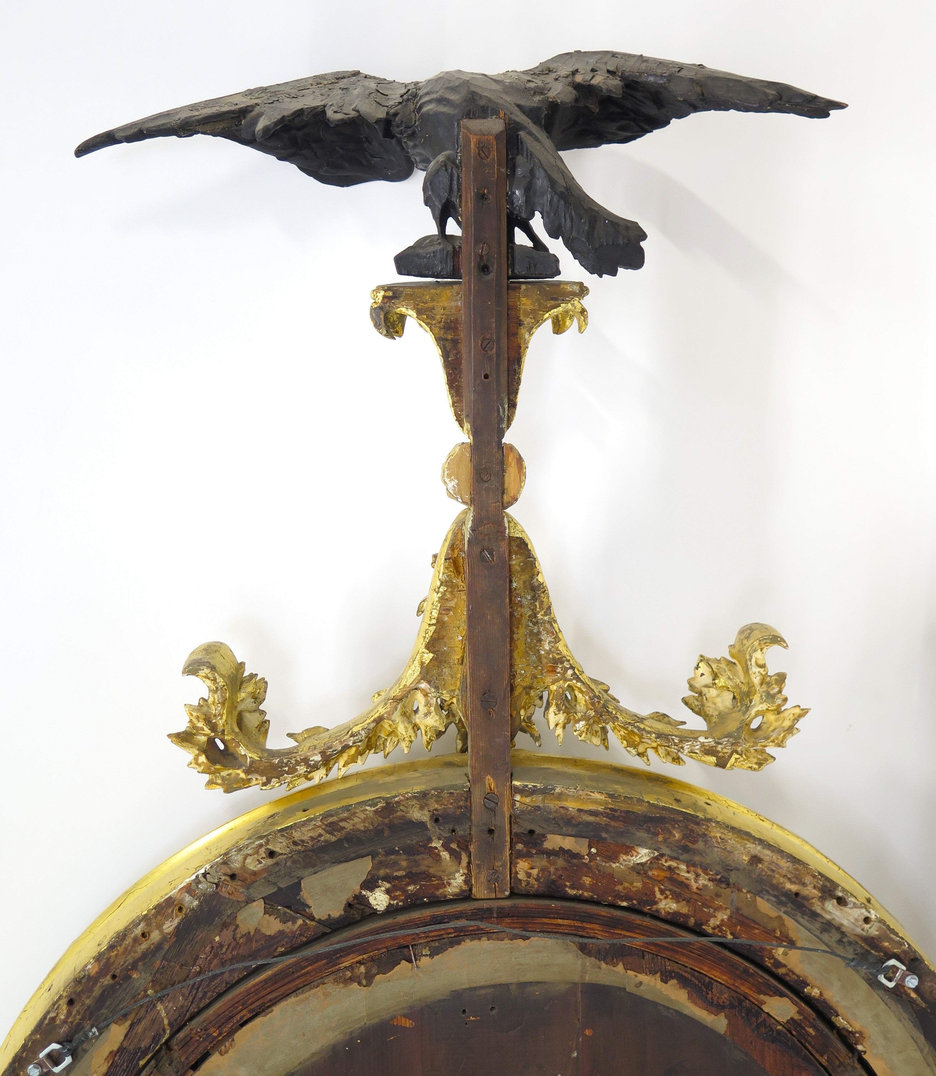 A Superb Early Regency Ebonised and Giltwood Convex Mirror