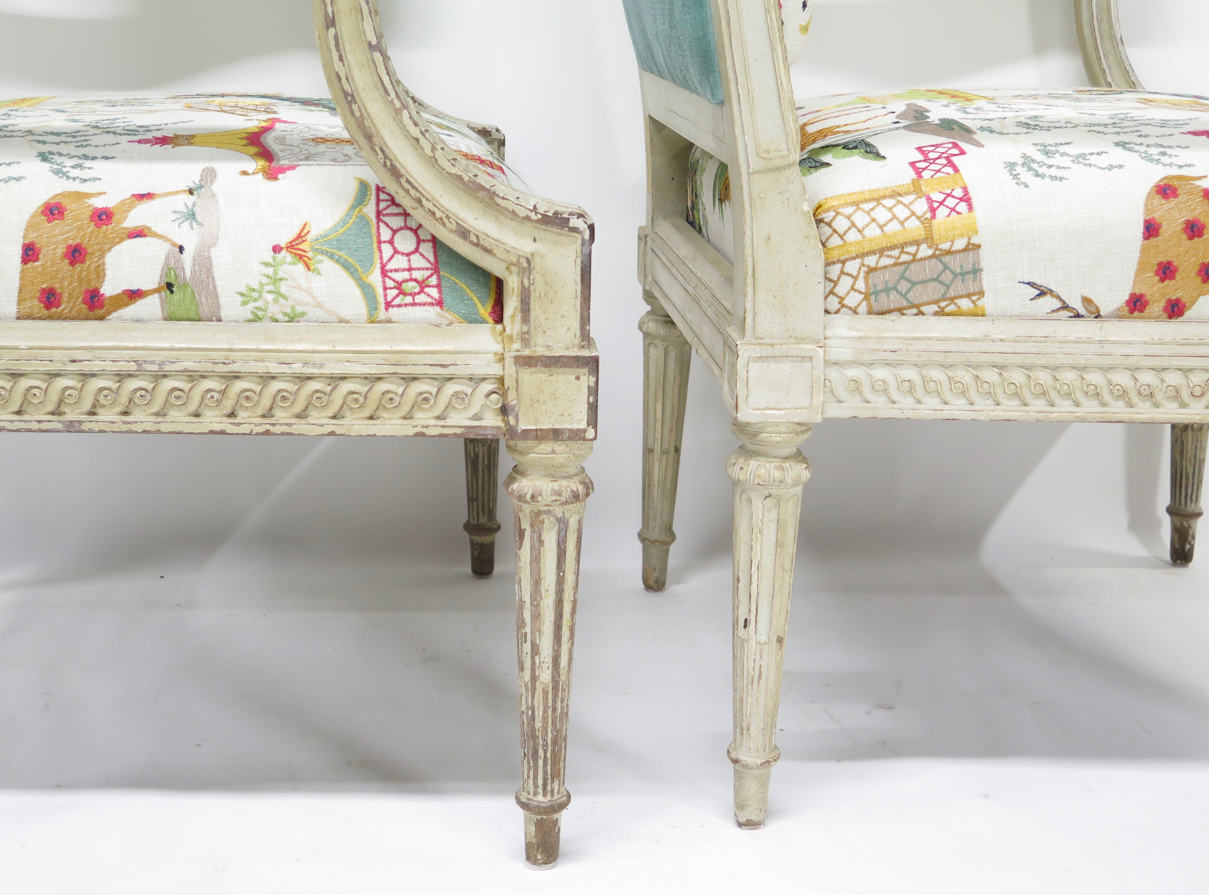 A Pair of Louis XVI Style Cream Colored Nicely Carved Fauteuils