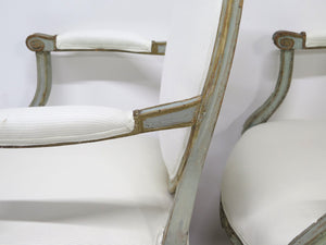 A Pair of 18th Century Paint and Parcel Gilt Italian Arm Chairs