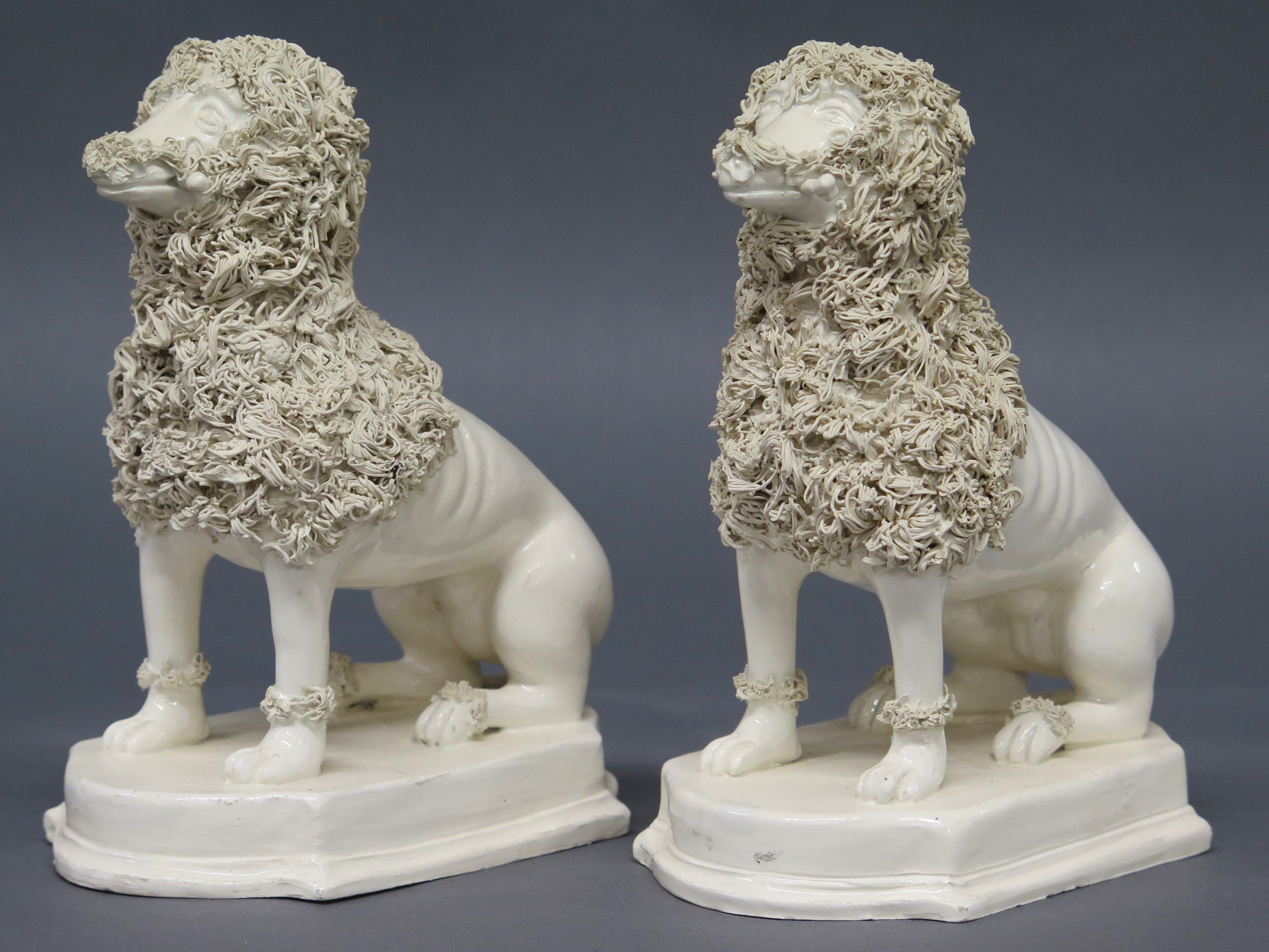 A Pair of Early 19th Century Creamware Dogs