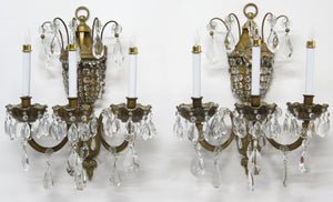 A Pair of Maison Jansen Three Light Bronze and Crystal Sconces