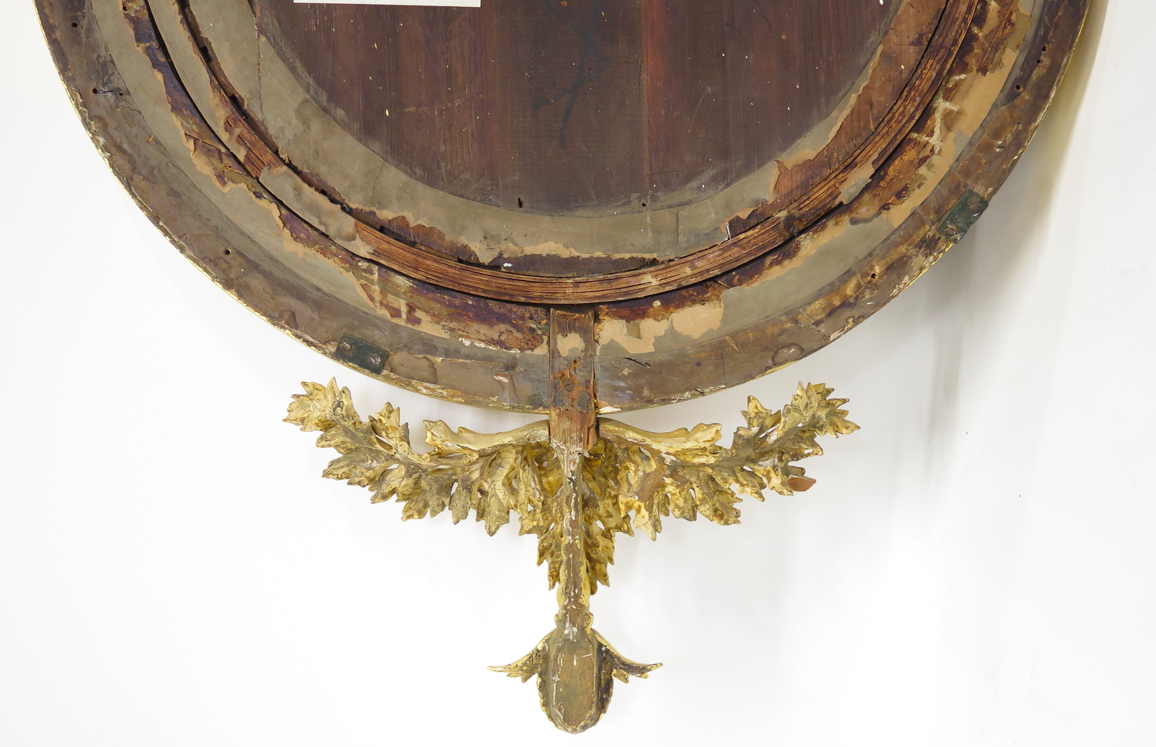 A Superb Early Regency Ebonised and Giltwood Convex Mirror