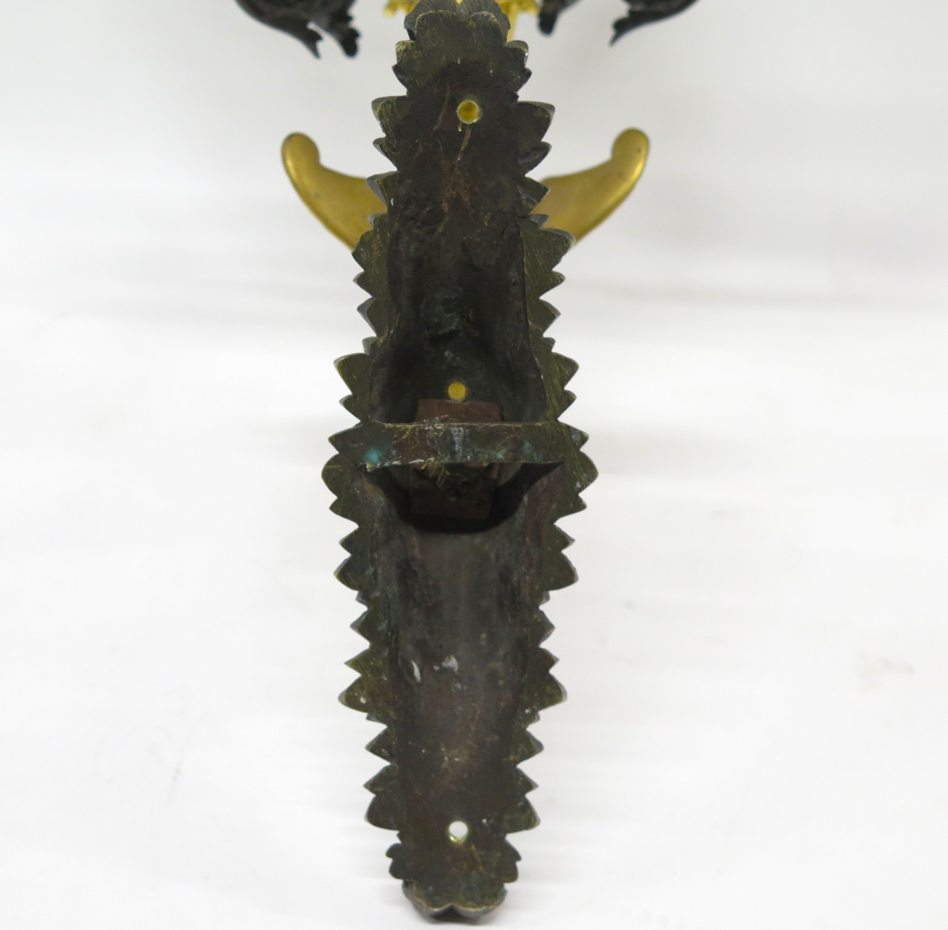 A Pair of Charles X Pattinated and Gilt Five Arm Wall Lights