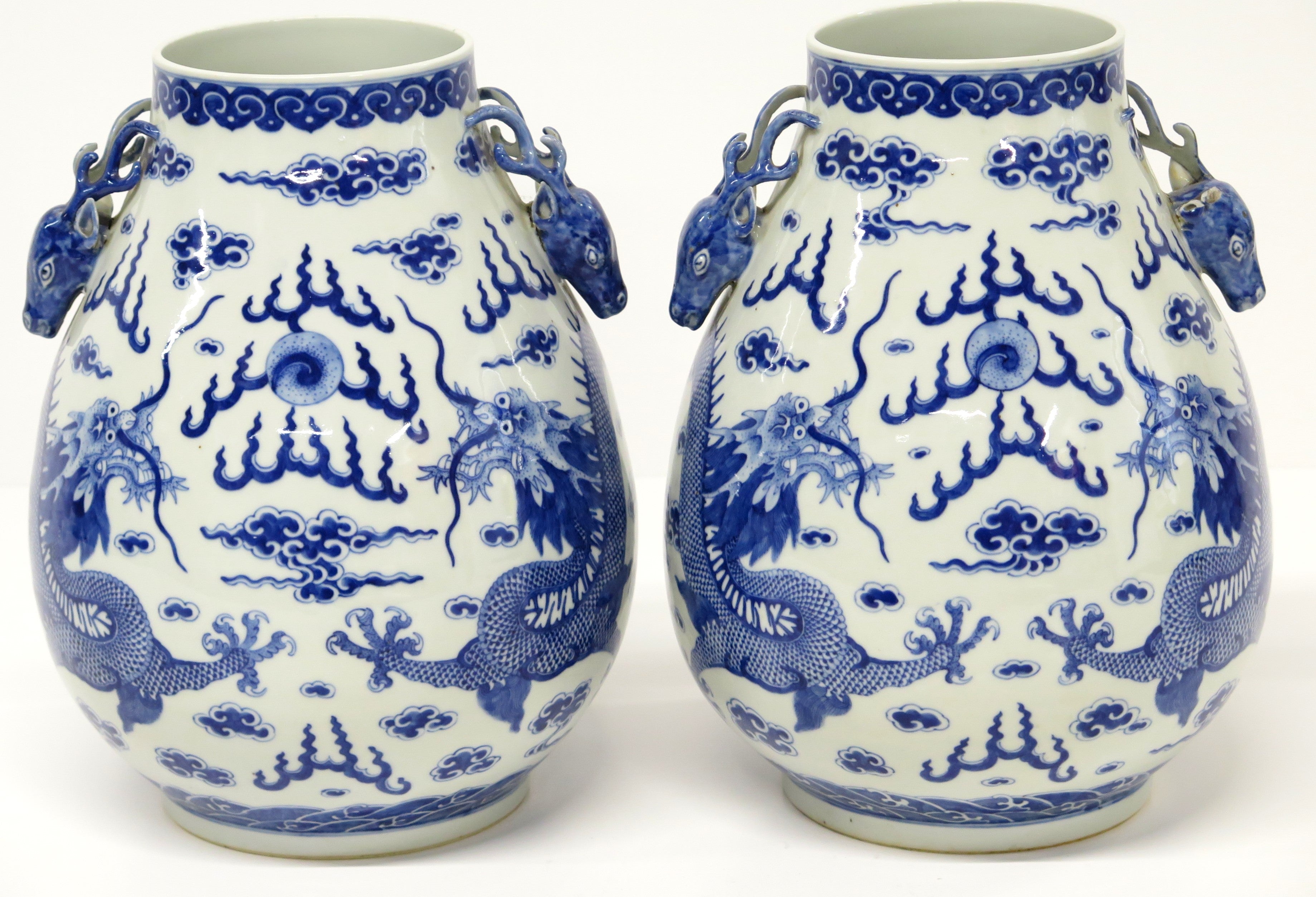A Pair of Chinese Blue and White Gu form Vases
