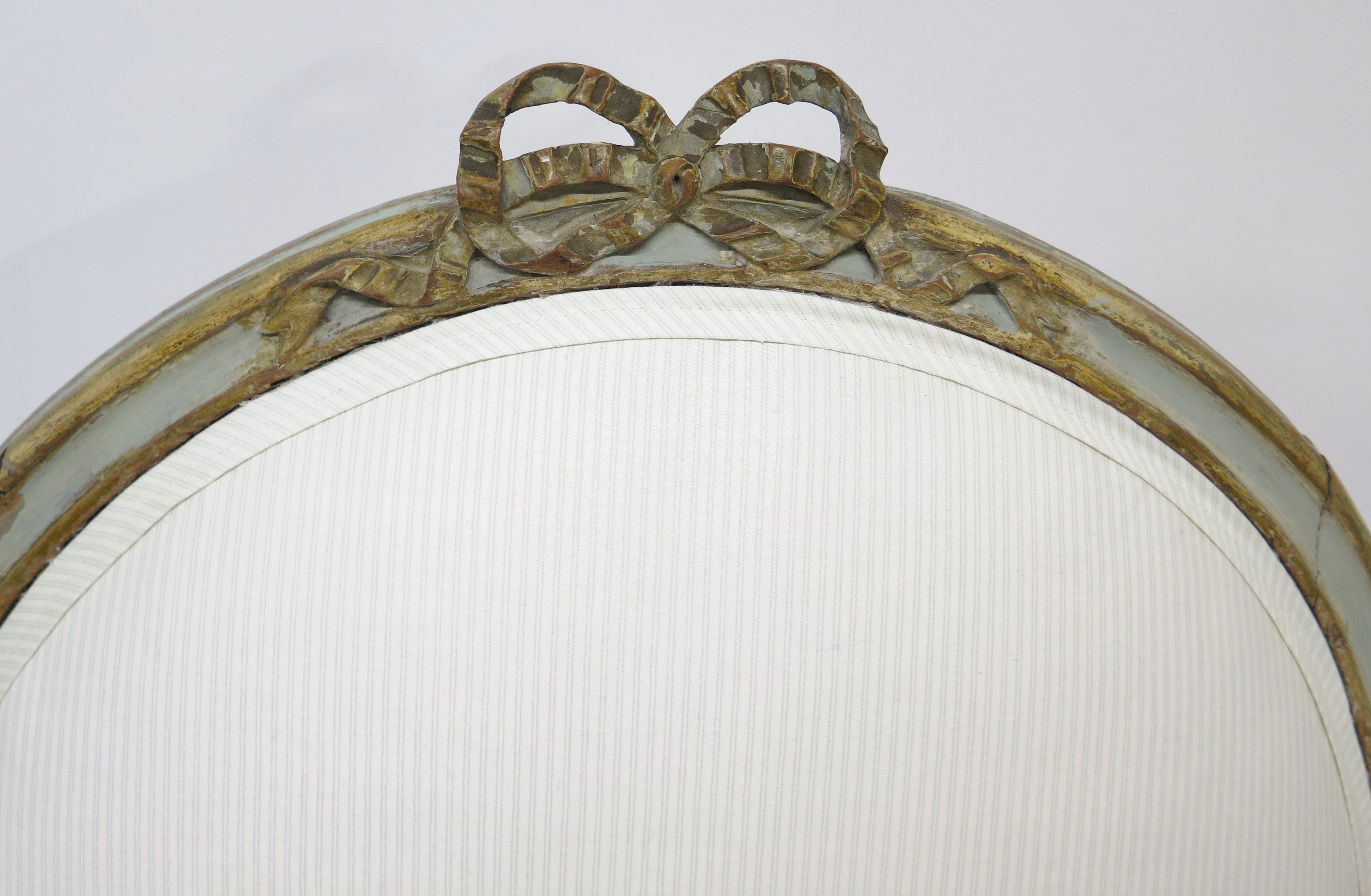 A Pair of 18th Century Paint and Parcel Gilt Italian Arm Chairs