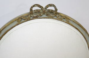 A Pair of 18th Century Paint and Parcel Gilt Italian Arm Chairs