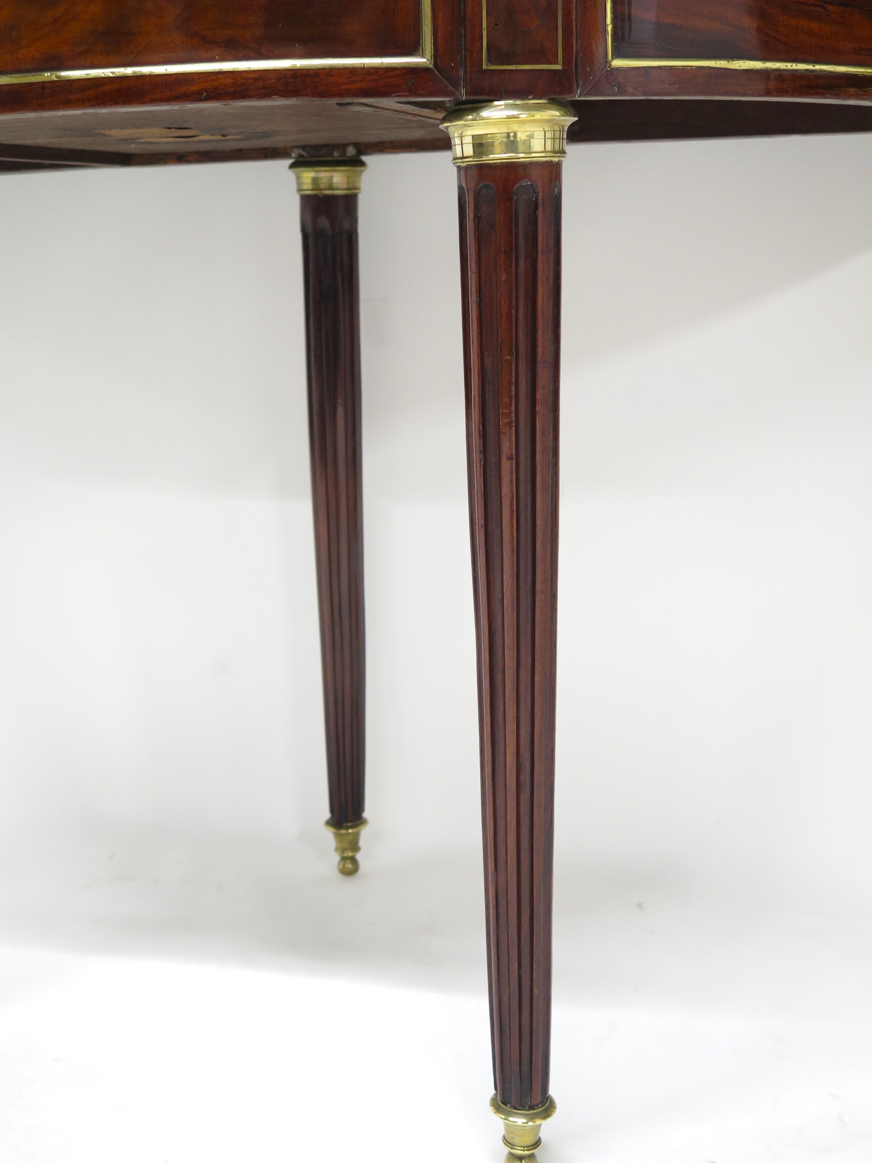 A Beatiful "Near" Pair of Louis XVI Style Mahogany and Brass Mounted Demilune Games Tables