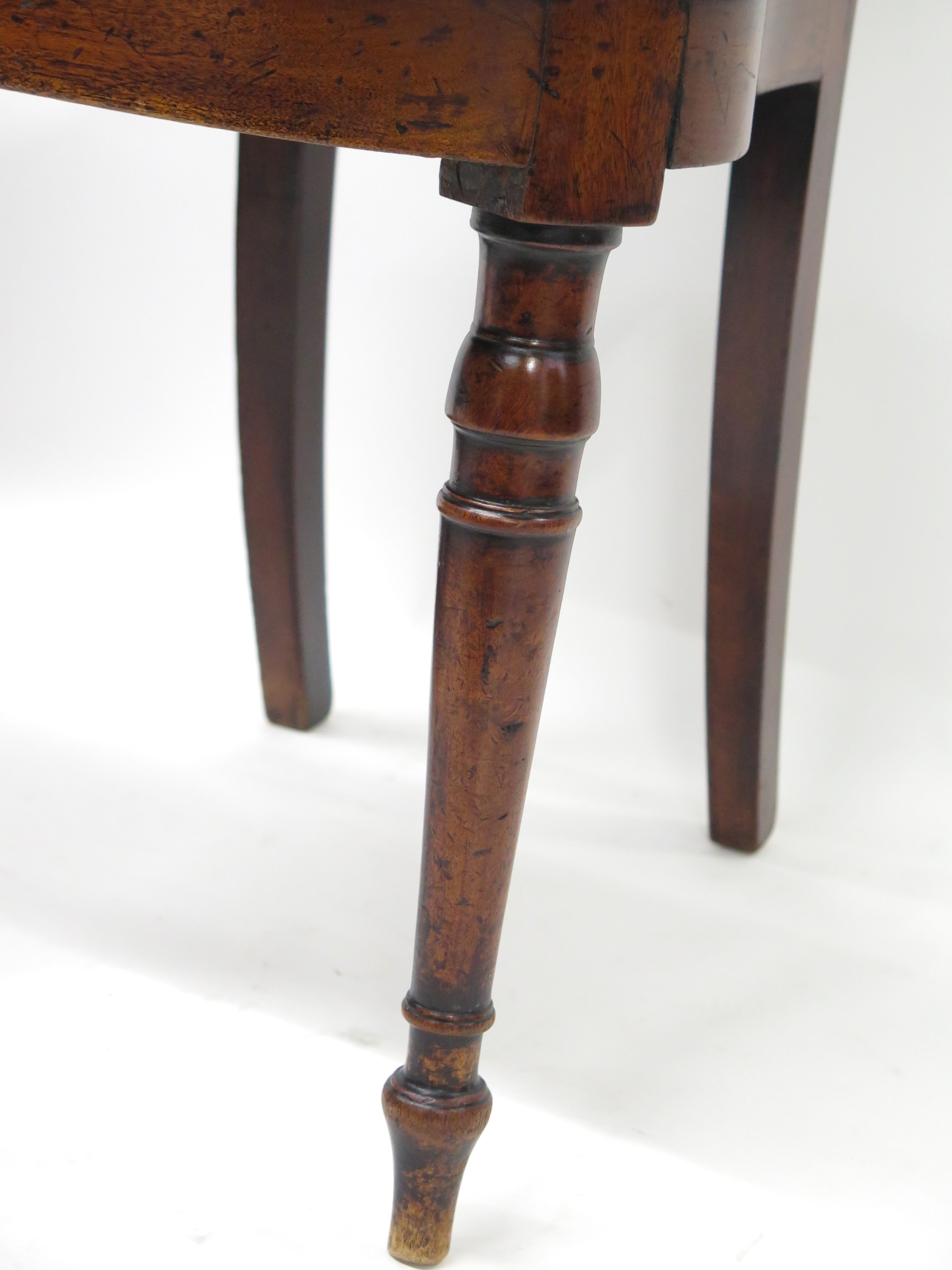 A Pair of English Regency Mahogany Hall Chairs