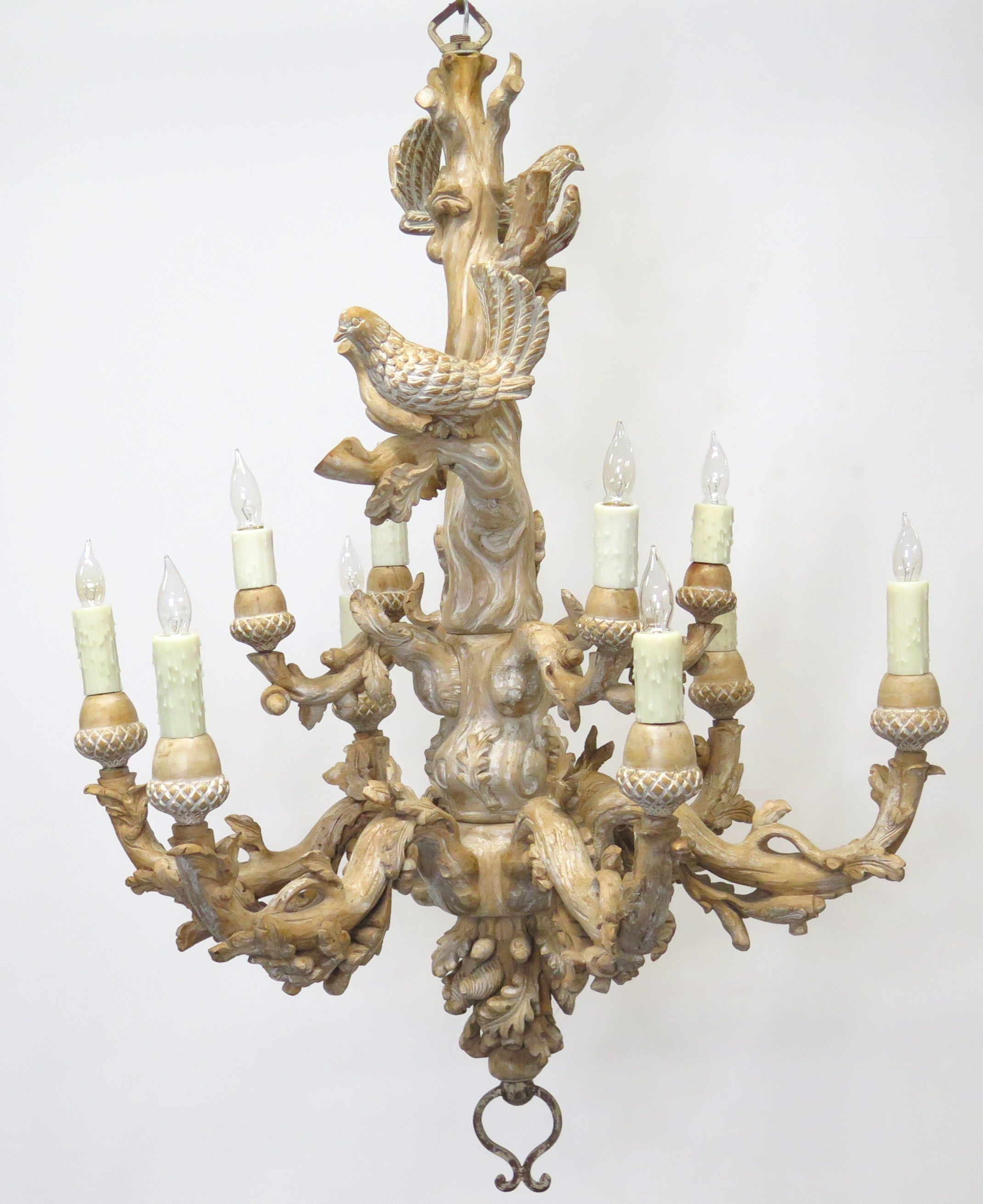 A Carved Italian Faux Bois Pickled Ten Light Chandelier