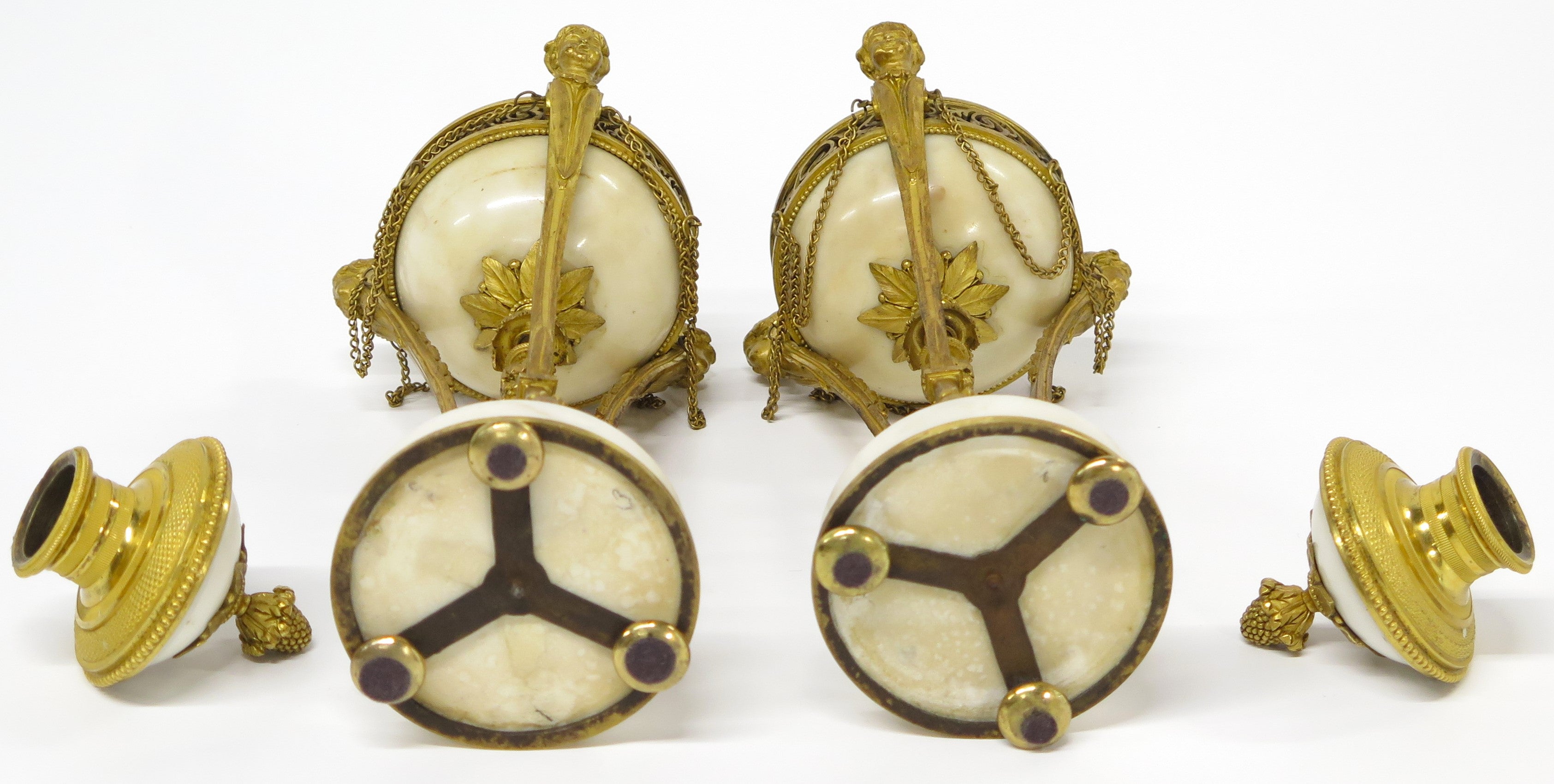 A Pair of Louis XVI Ormolu and White Marble Cassolettes