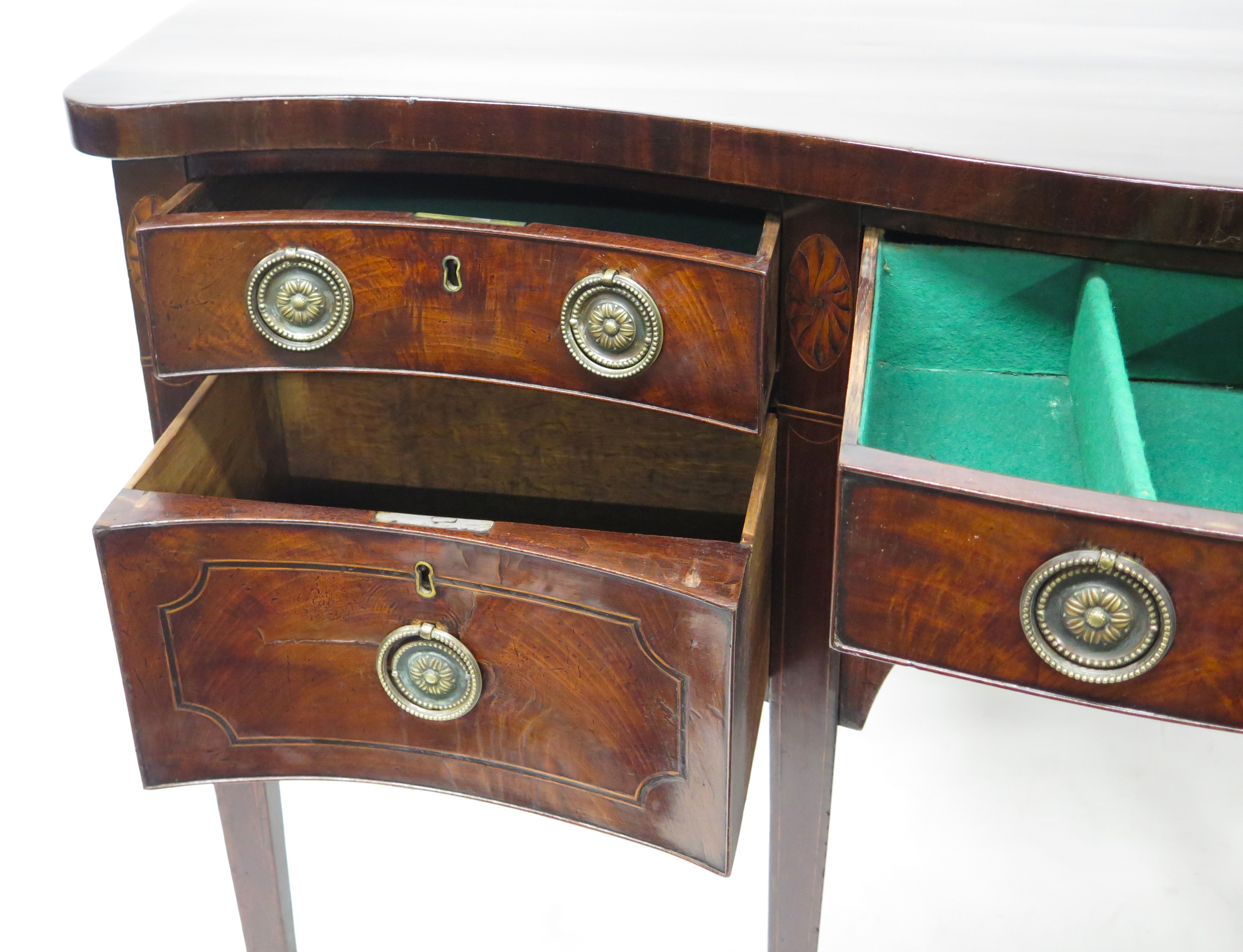 A George III Serpentine Front Mahogany Sideboard