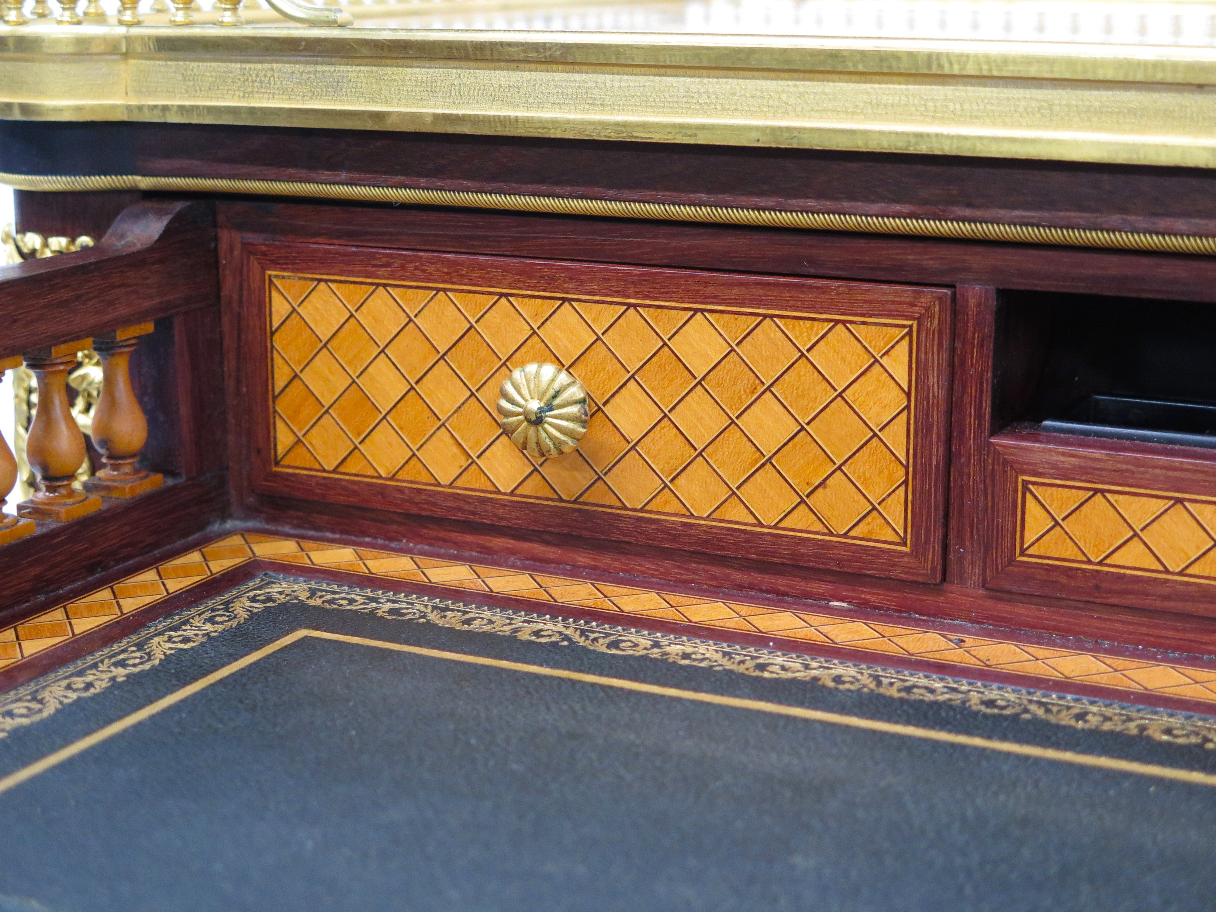 A Very Fine French 19th Century Ormolu-mounted Mahogany and kingwood Table à écrire ( Writing Table ) in the Louis XVI Style