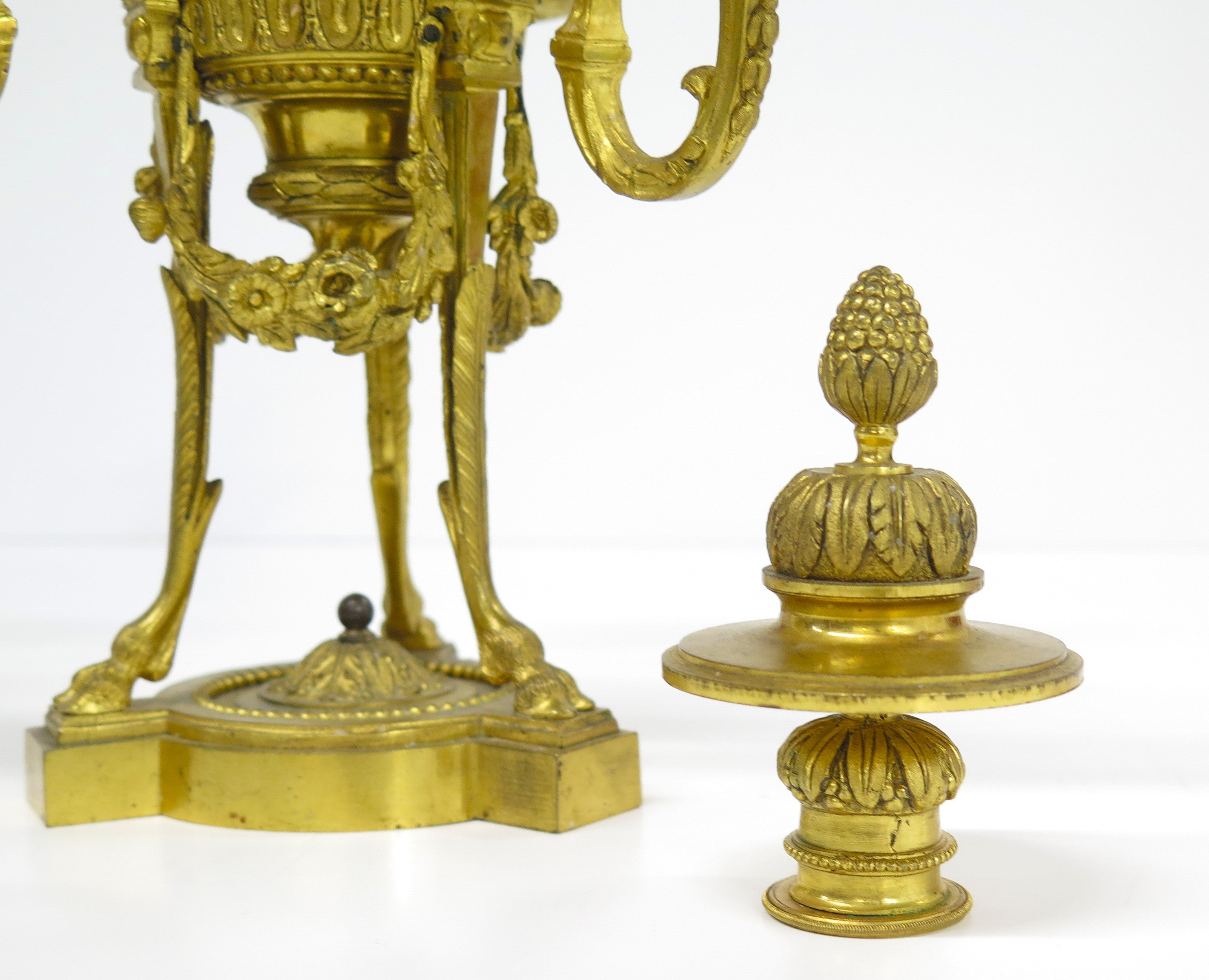 A Pair of Finely Cast and Chased Louis XVI Ormalu Four-Light Cassolette