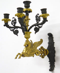A Pair of Charles X Pattinated and Gilt Five Arm Wall Lights