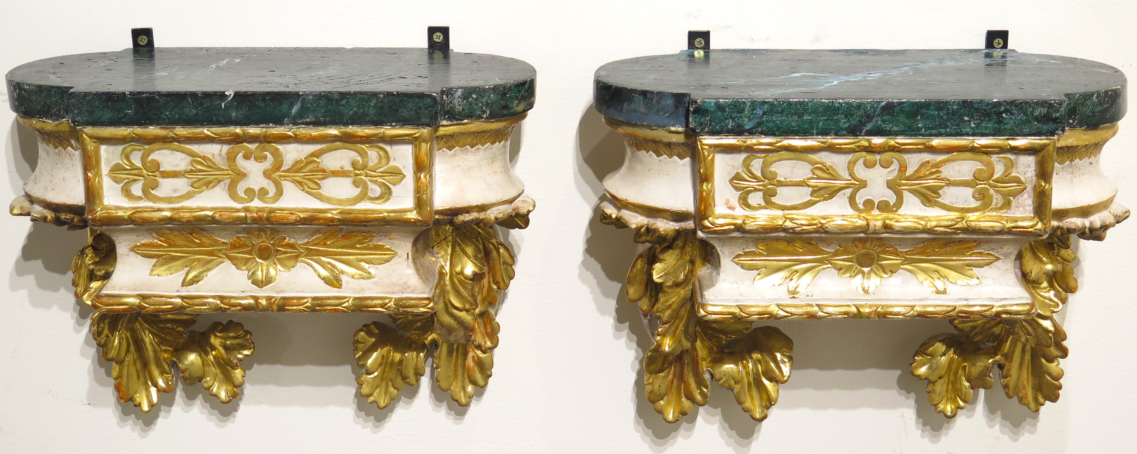 Pair of Carved Painted and Parcel Gilt Wall Brackets