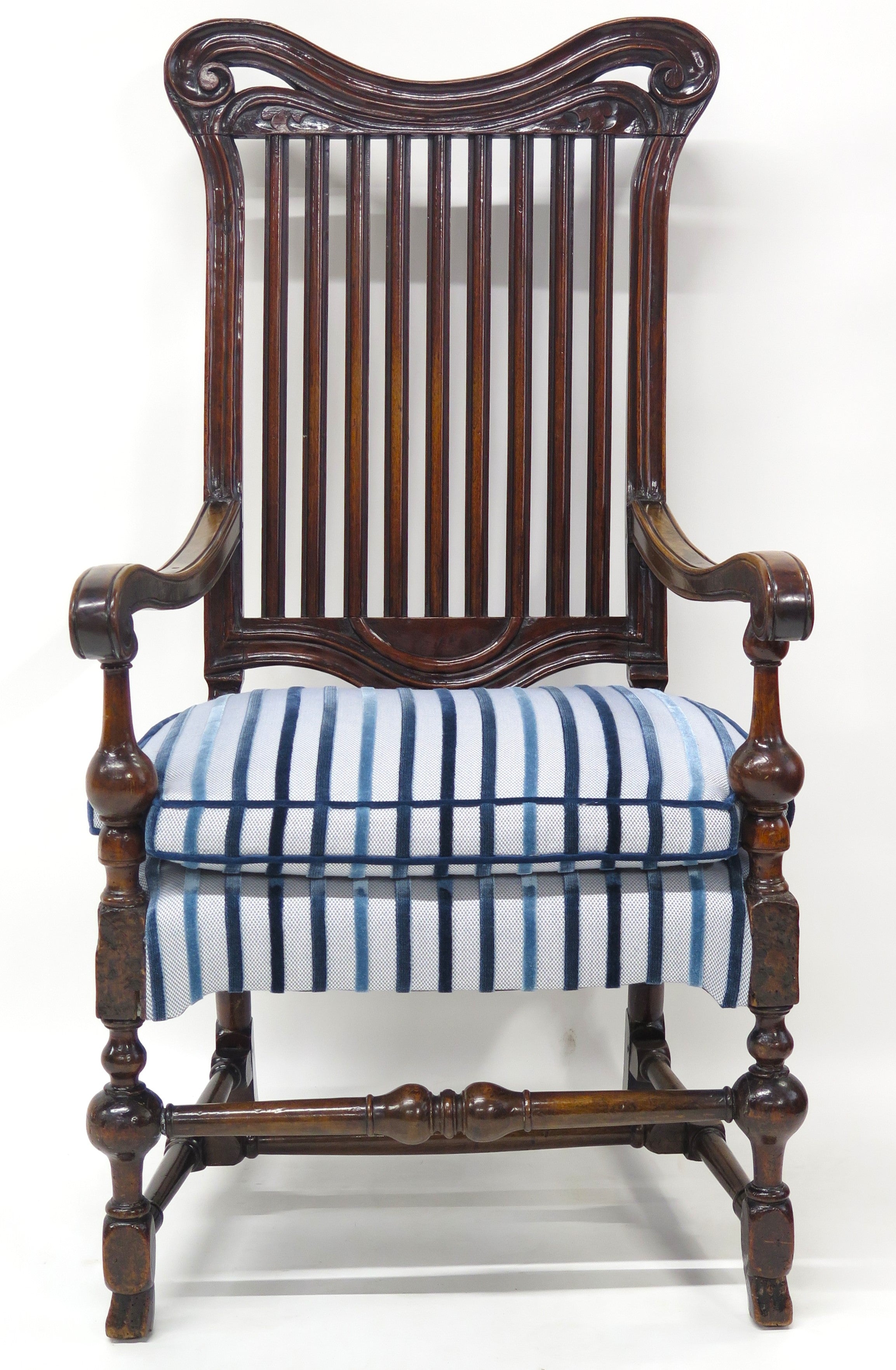 A Rare Form William and Mary Walnut Banister Back Armchair