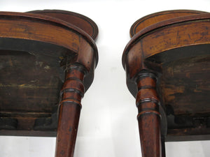 A Pair of English Regency Mahogany Hall Chairs