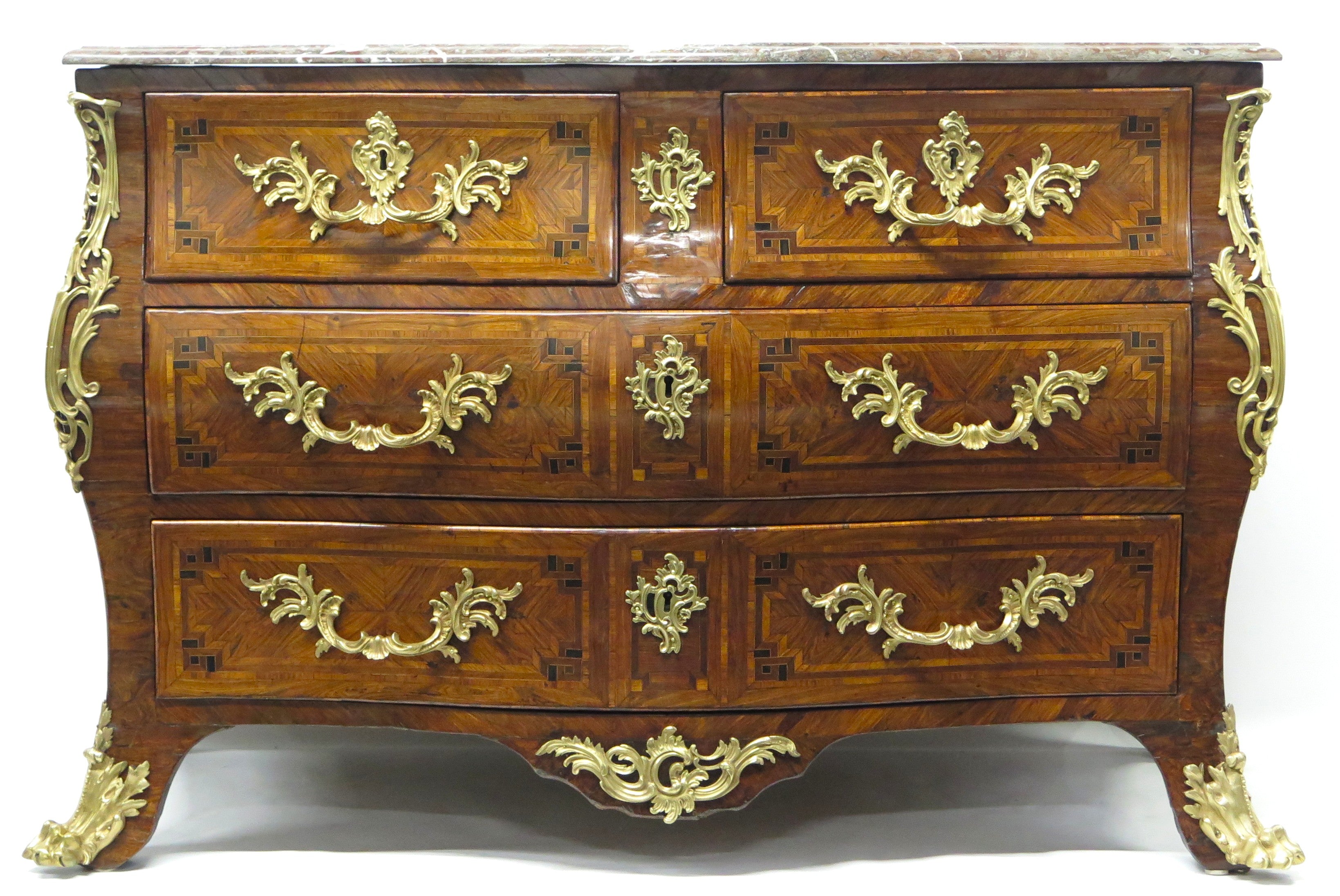 A Louis XV Chest in Violet Wood/Purpleheart Veneer, Crossbanded in