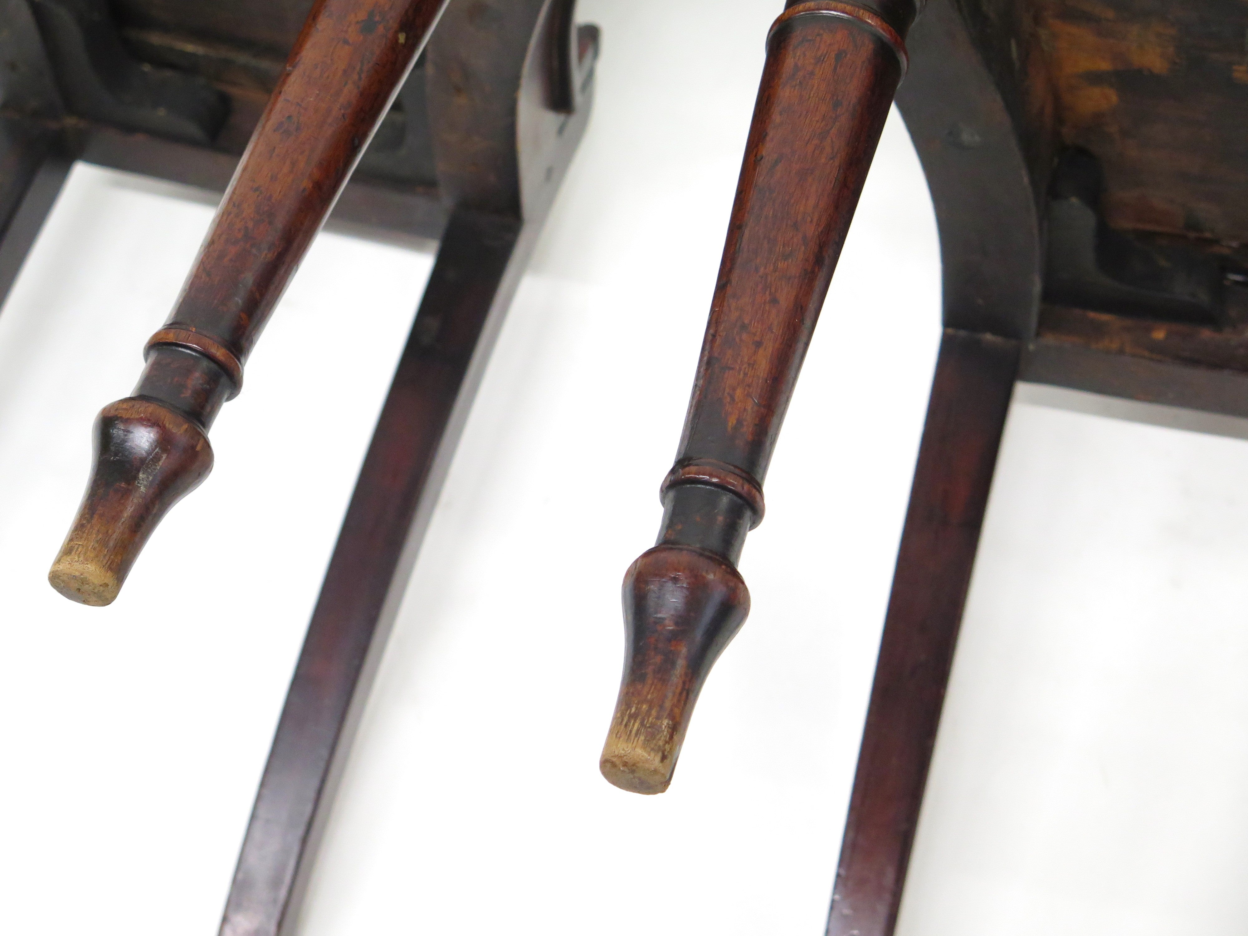 A Pair of English Regency Mahogany Hall Chairs