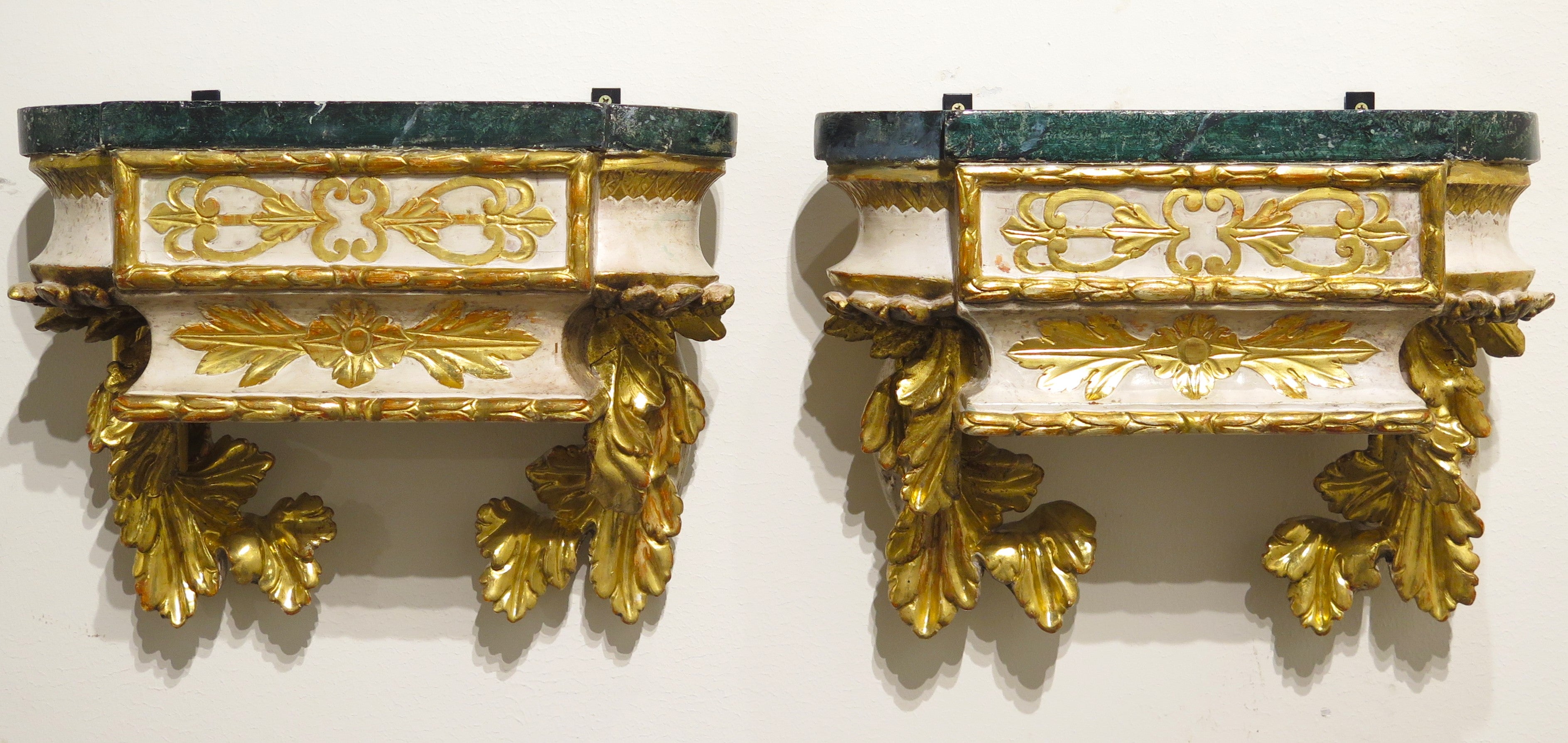 Pair of Carved Painted and Parcel Gilt Wall Brackets