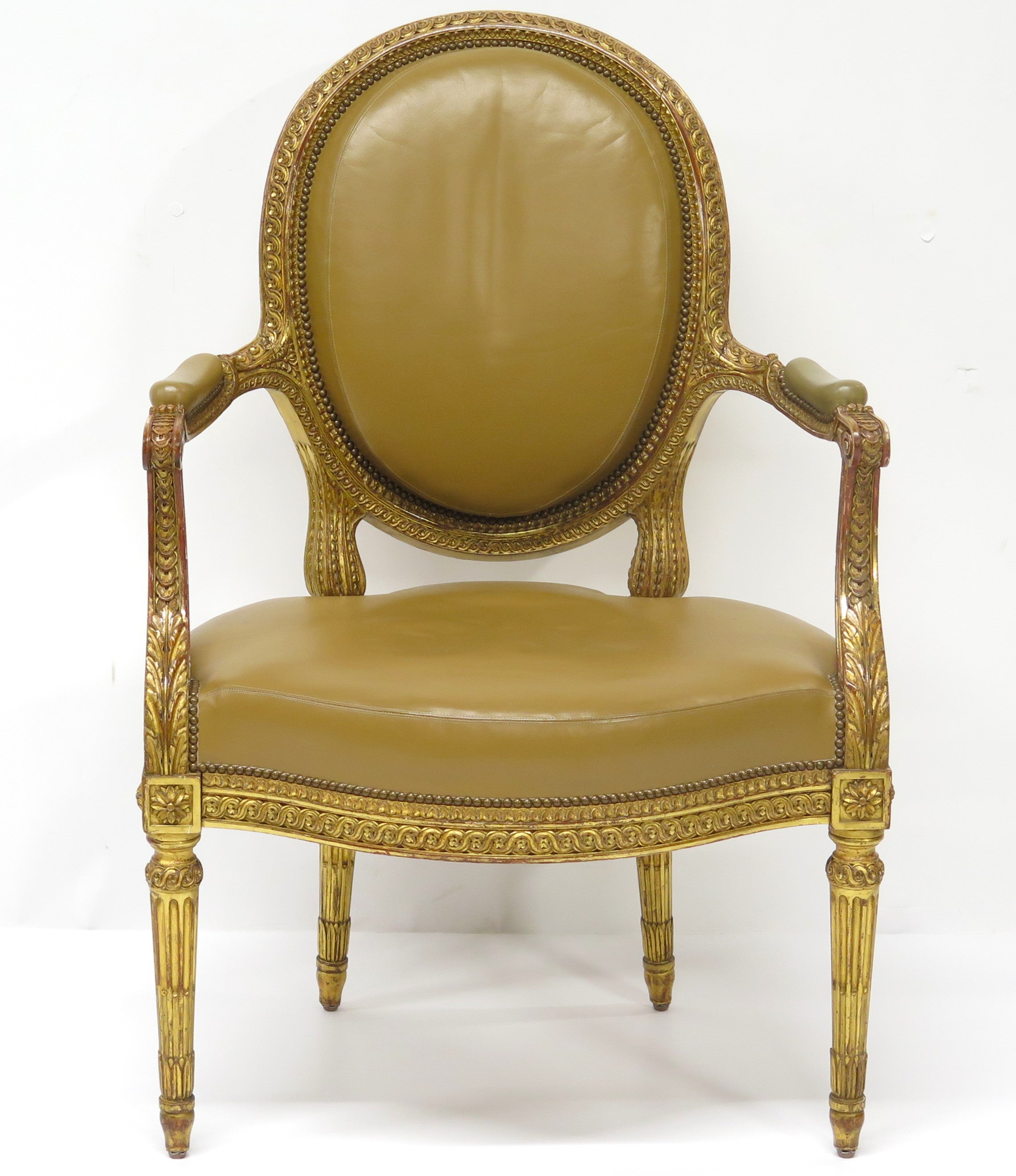 Louis XVI-Style Carved and Gilded Leather Fauteuil