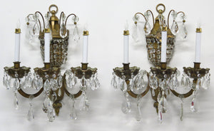 A Pair of Maison Jansen Three Light Bronze and Crystal Sconces