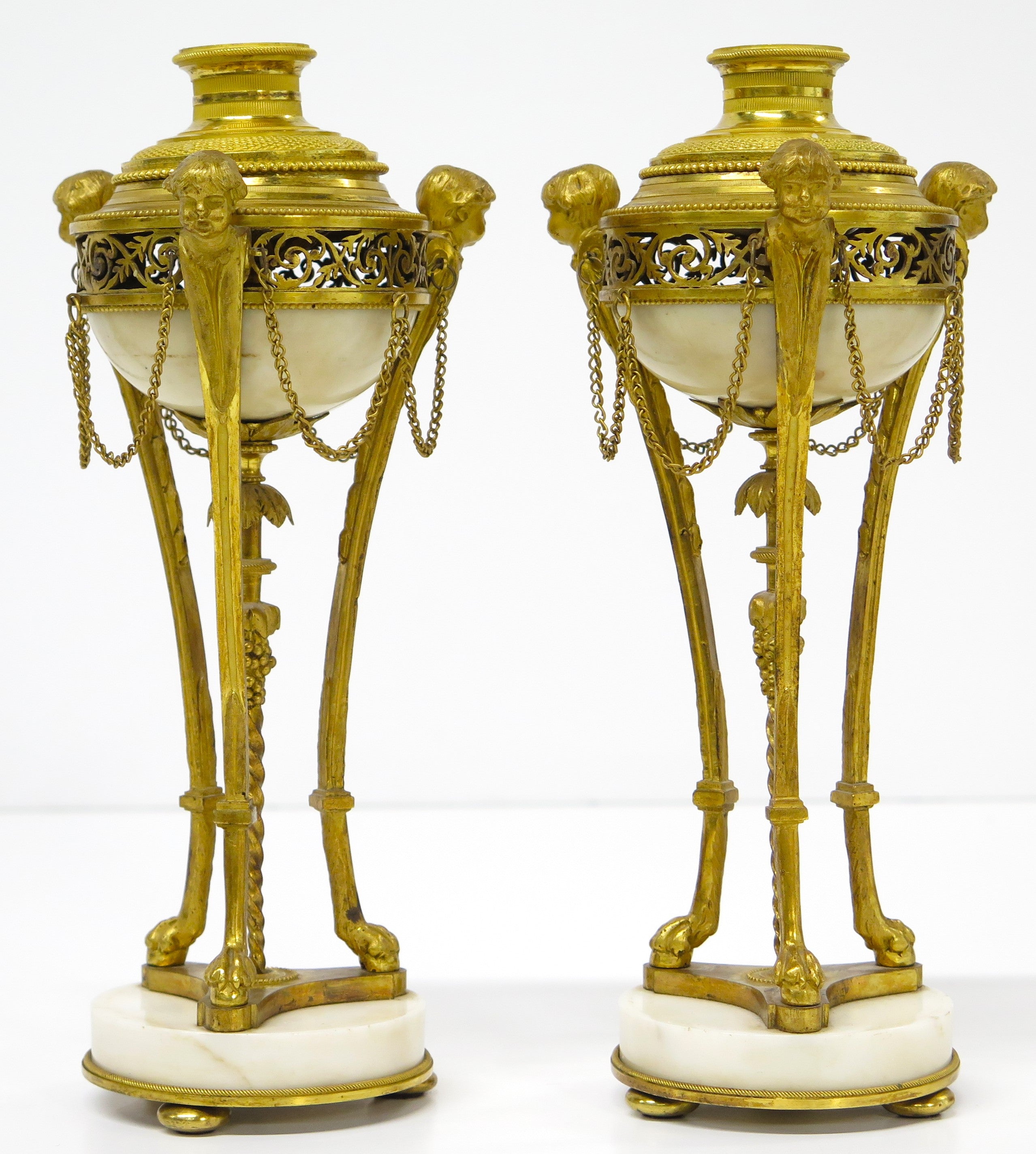 A Pair of Louis XVI Ormolu and White Marble Cassolettes