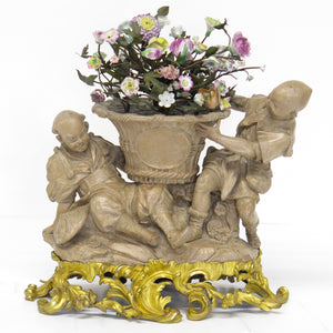 A Louis XV-Style Ormolu Mounted Terracotta Tôle Painted and Porcelain Centerpiece