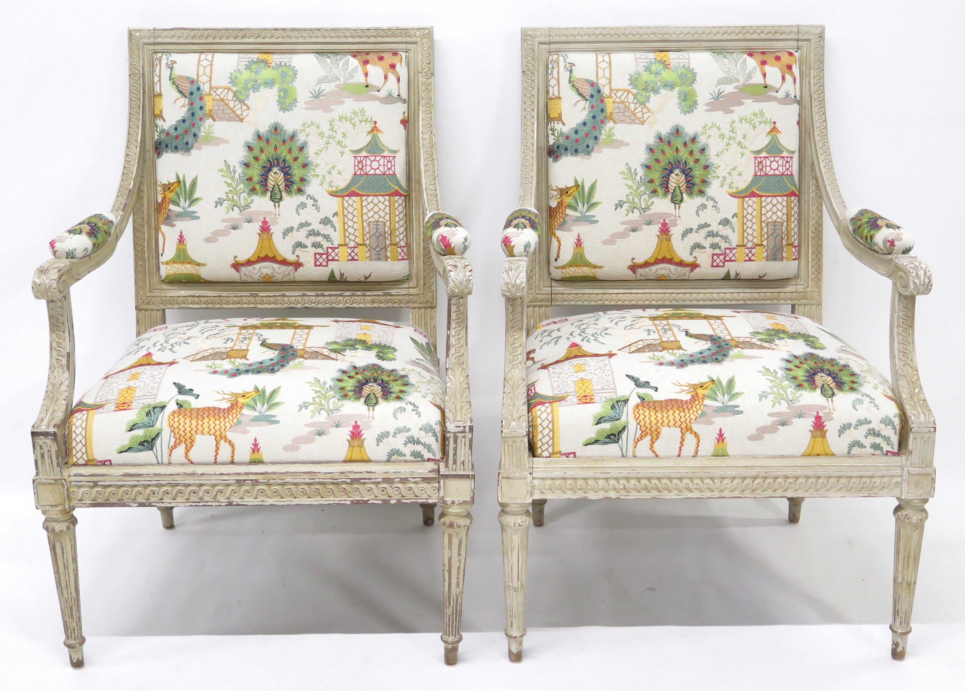 A Pair of Louis XVI Style Cream Colored Nicely Carved Fauteuils