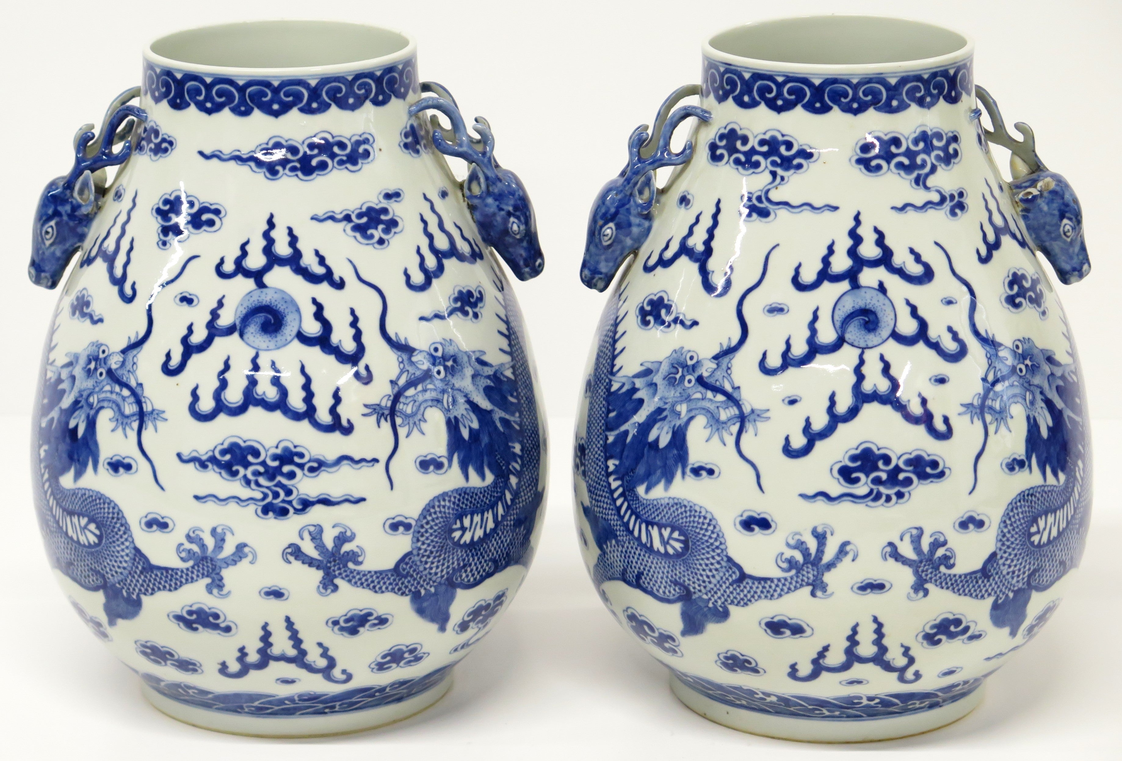 A Pair of Chinese Blue and White Gu form Vases