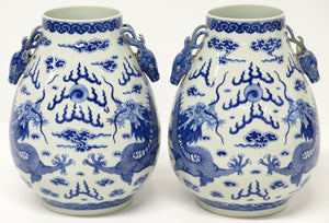 A Pair of Chinese Blue and White Gu form Vases