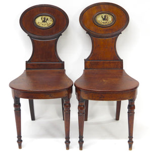 A Pair of English Regency Mahogany Hall Chairs
