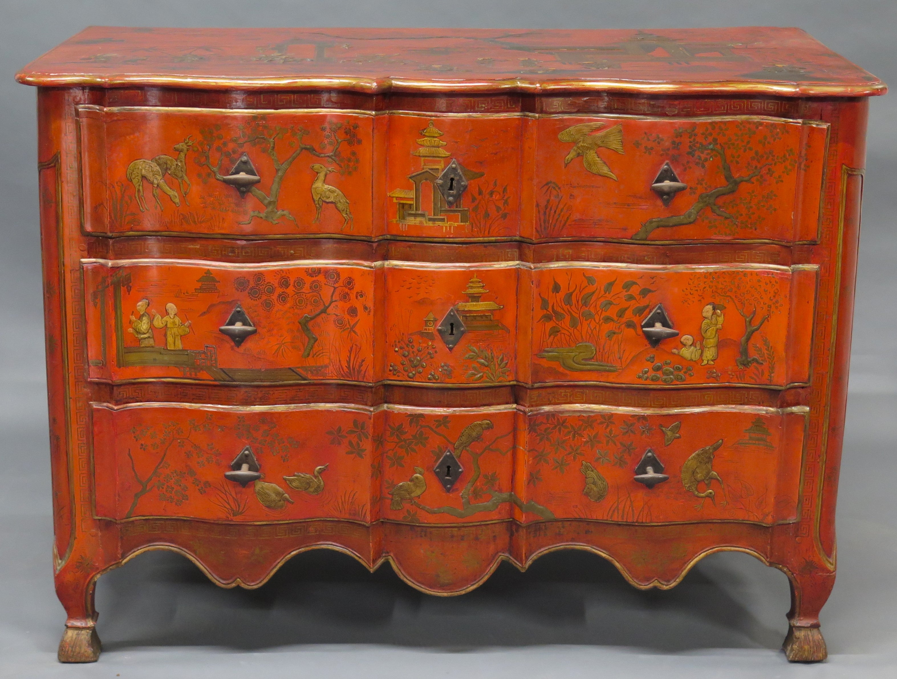 A Continental Red Chinoiserie Decorated Chest