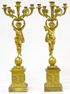 A Pair of French Empire Six Light Figural Candelabra