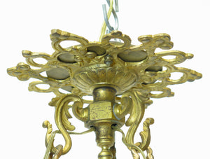 A French Art Deco alabaster and gilt bronze chandelier