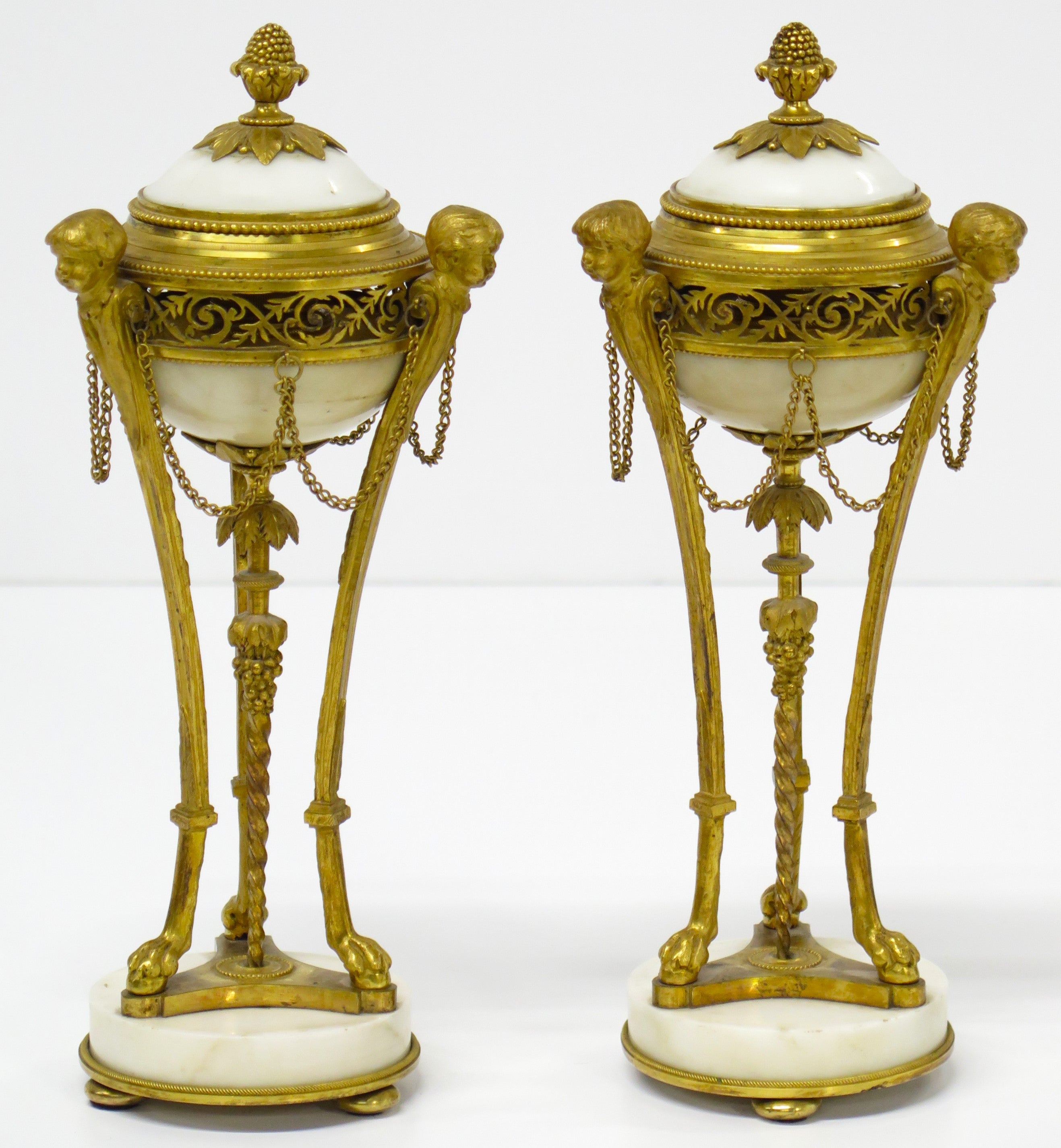A Pair of Louis XVI Ormolu and White Marble Cassolettes
