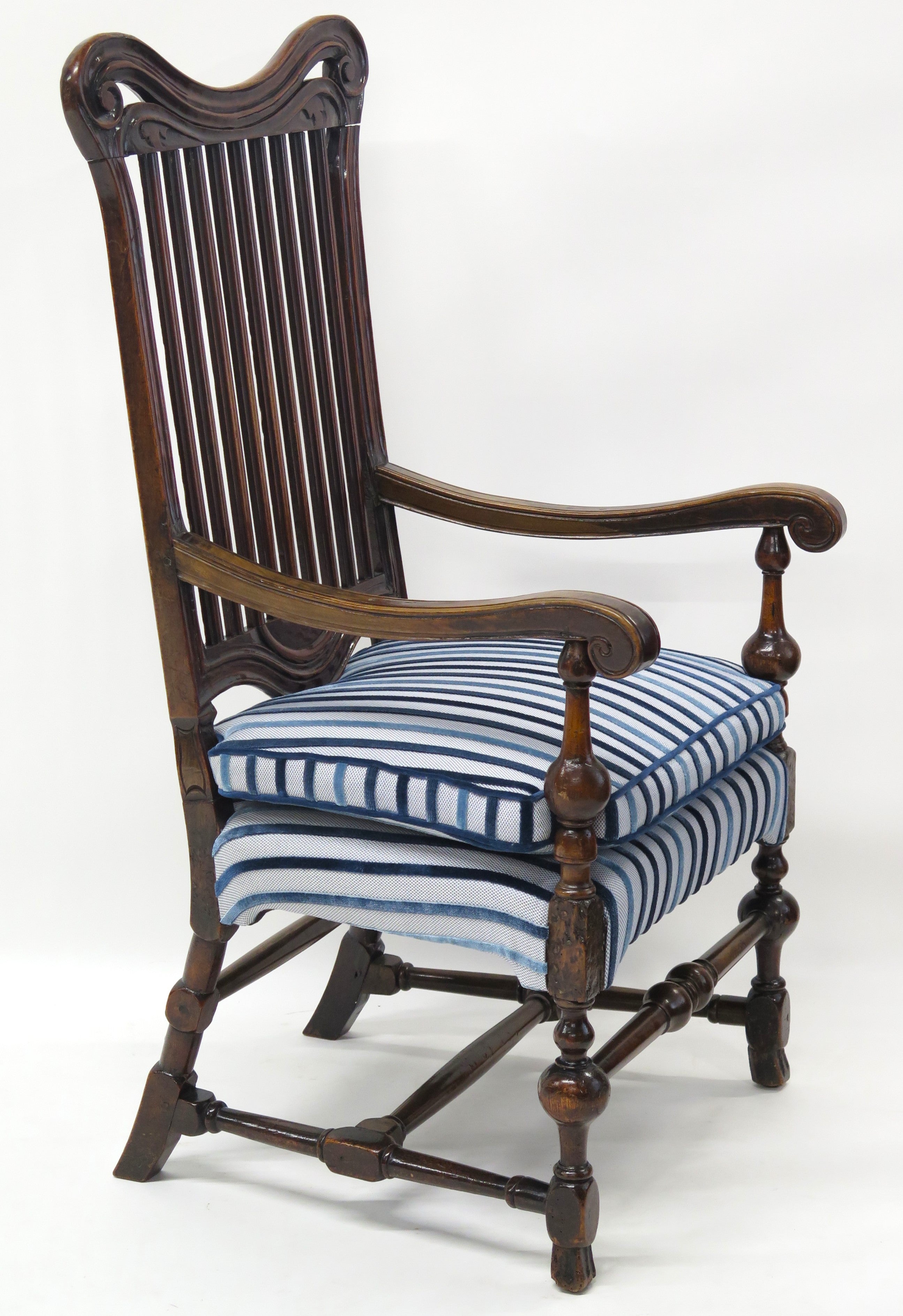 A Rare Form William and Mary Walnut Banister Back Armchair