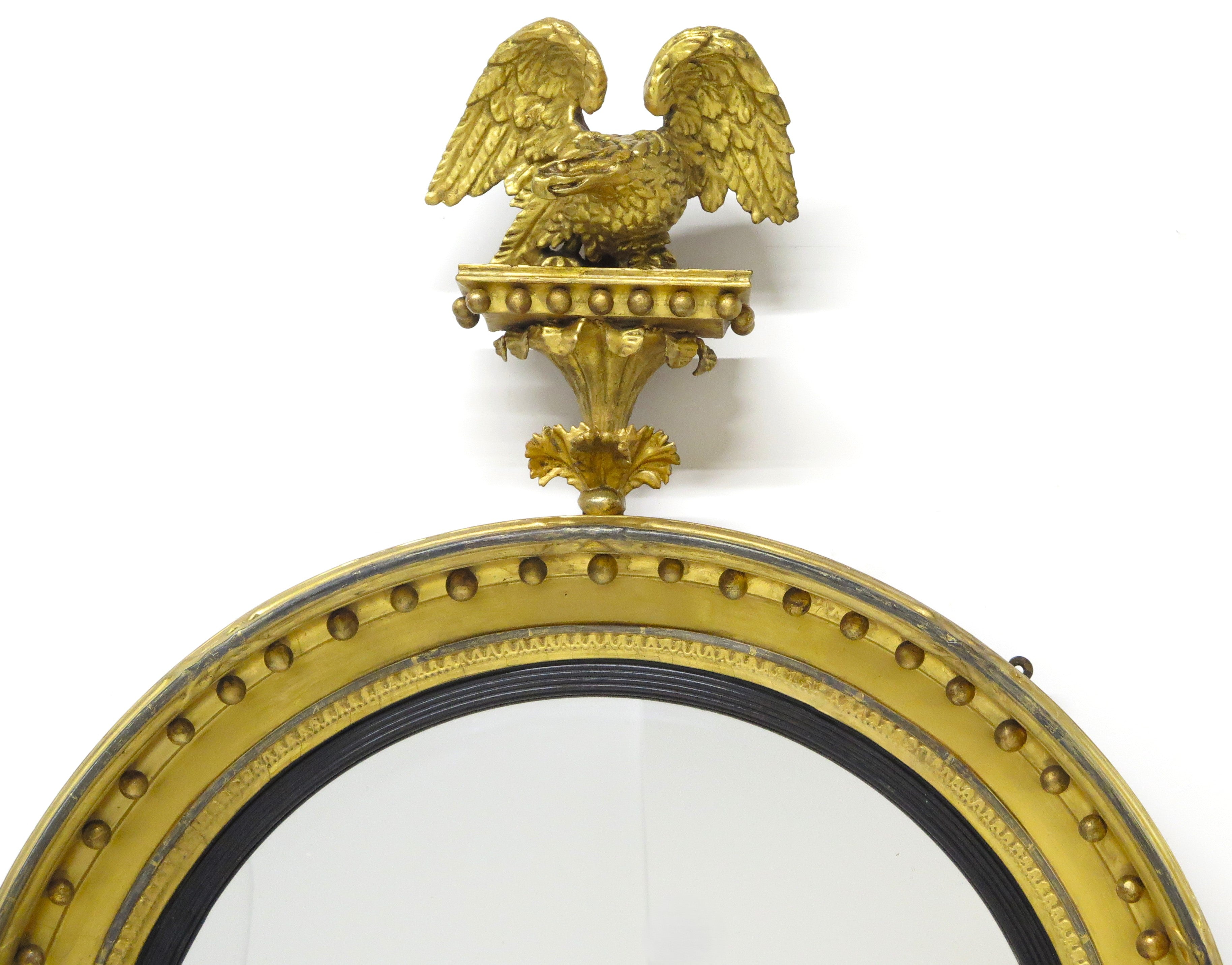 A Large English Regency Gilt Wood Convex Mirror